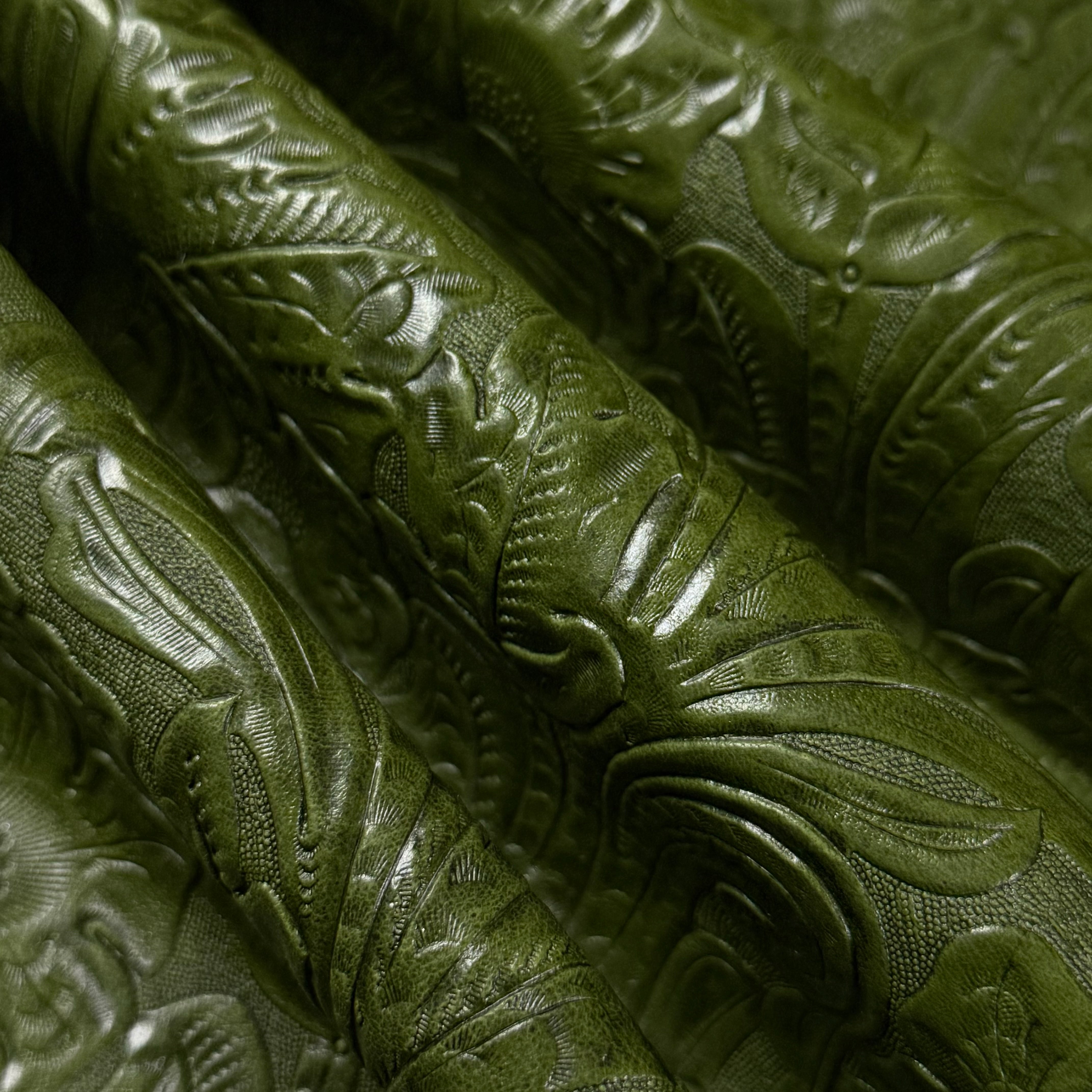 Green floral embossed oiled veg tan lamb leather, 2 oz, with a glovey feel.
