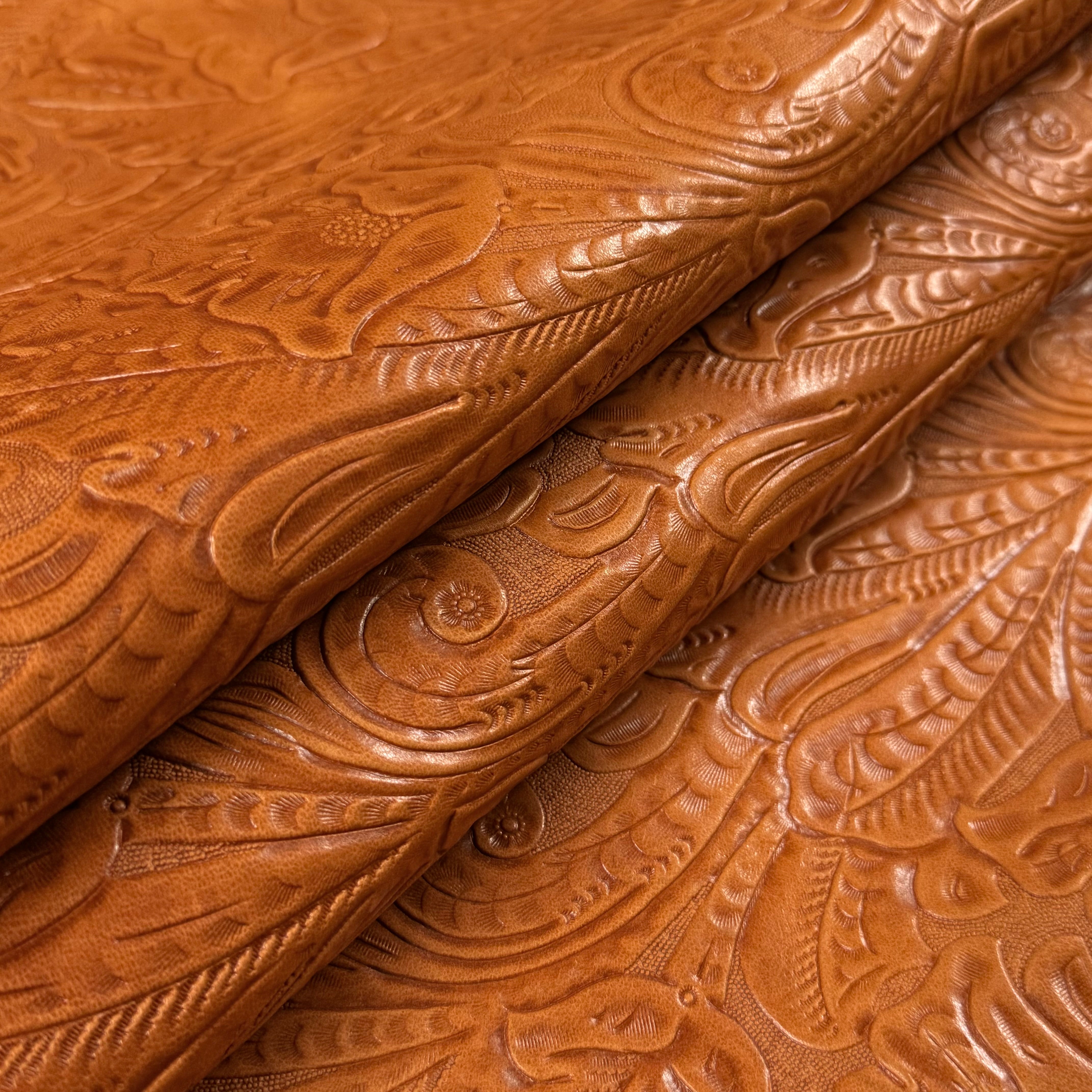 Brown floral embossed oiled veg tan lamb leather with a Sheridan pattern.