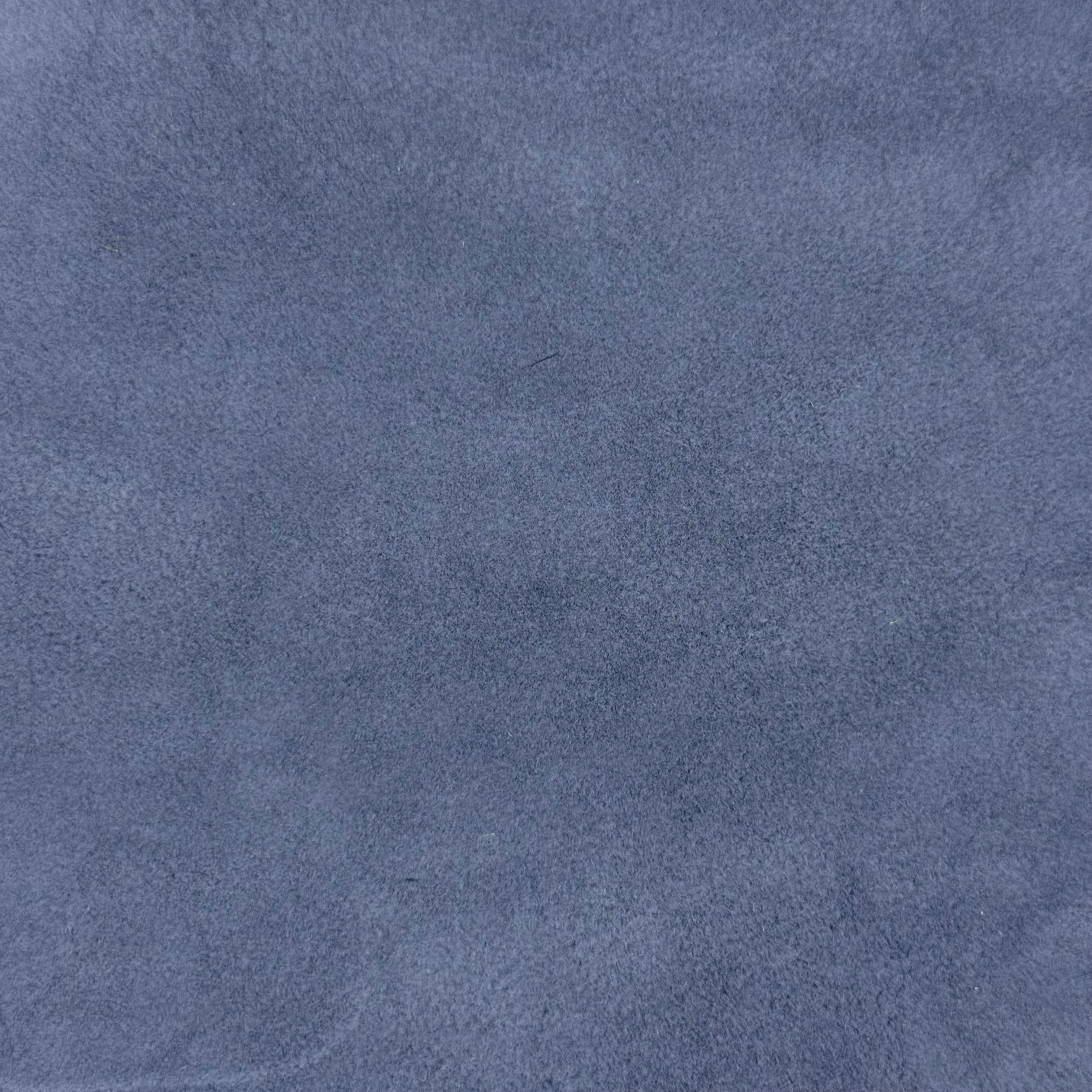 Close-up of soft, suede-like Conceria Incas Italian Water Calf leather in a muted blue-gray color.