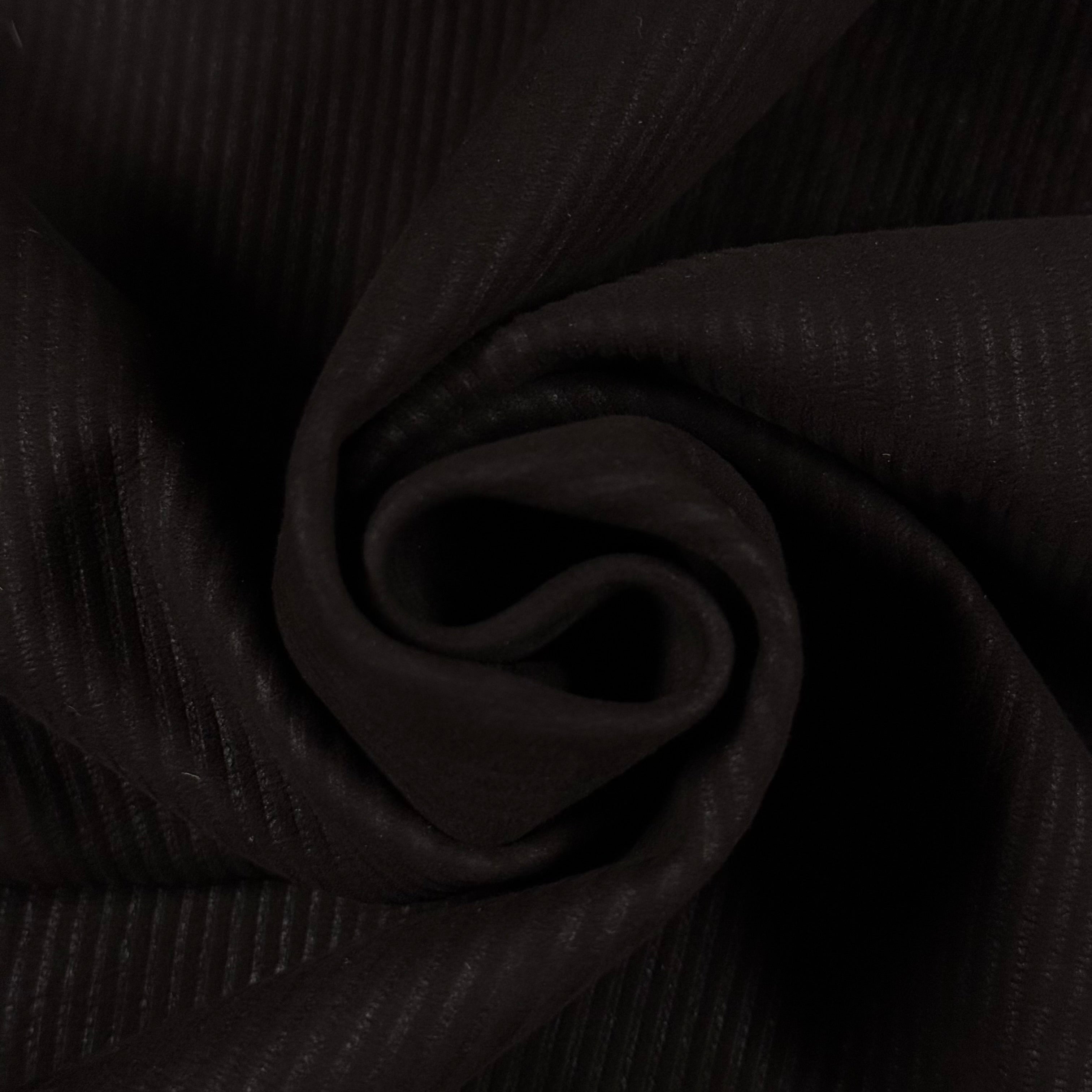 Dark brown corduroy Metis lamb suede with a ribbed texture and soft drape.