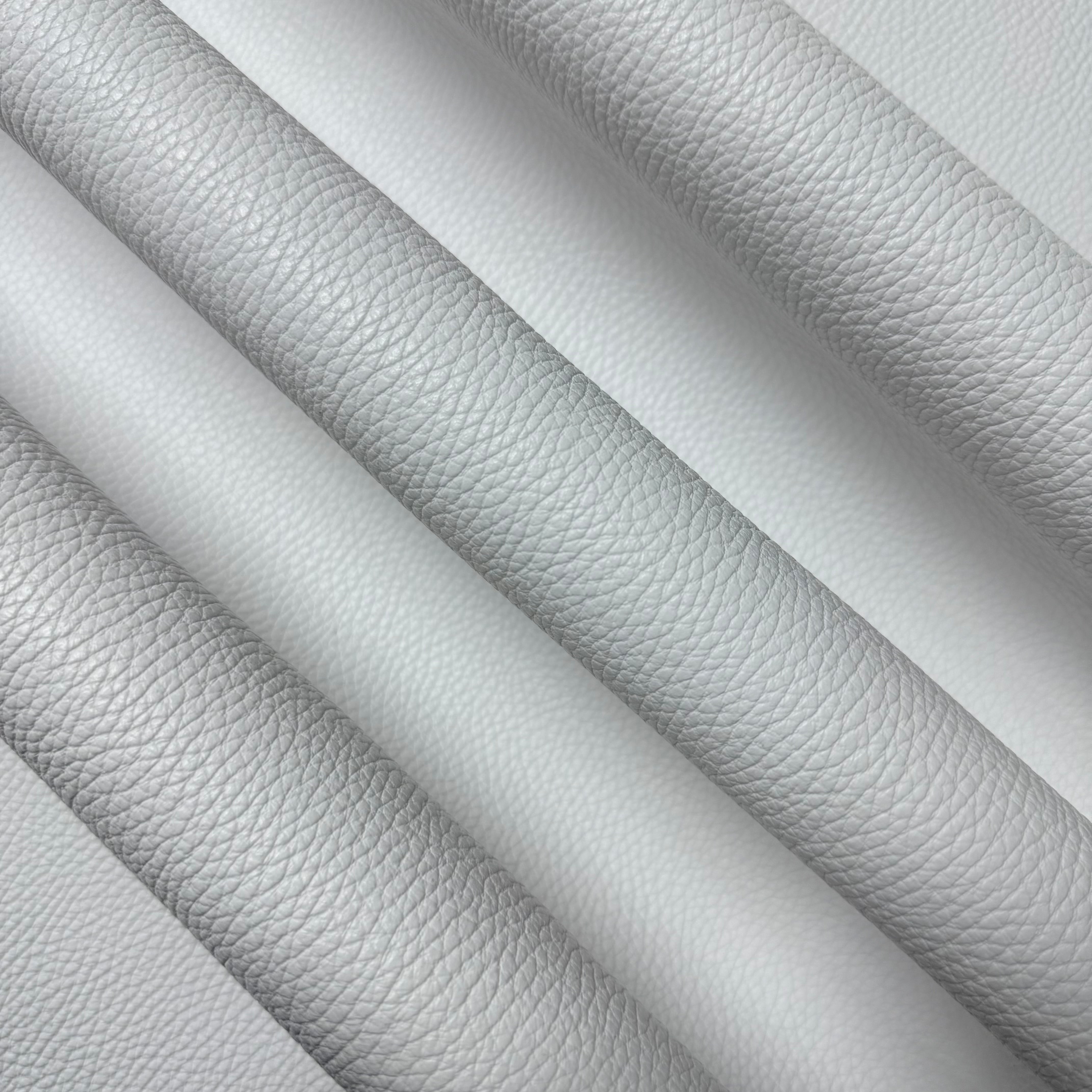 White Pebble Grain Calf leather, 3-4 oz, featuring a textured, durable surface rolled in diagonal layers.