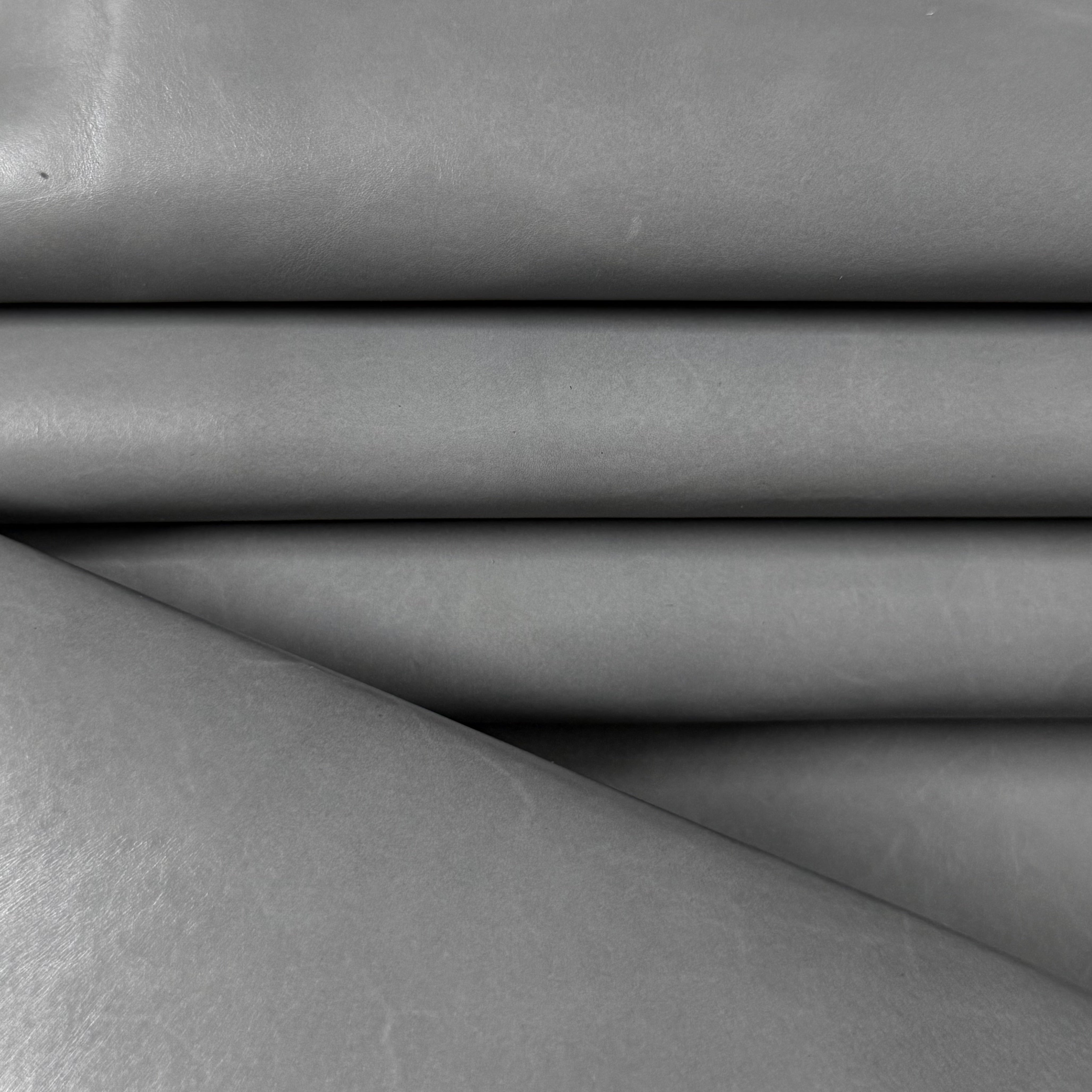Smooth gray vegetable-tanned baby calf leather, 2 oz, with a polished aniline finish.