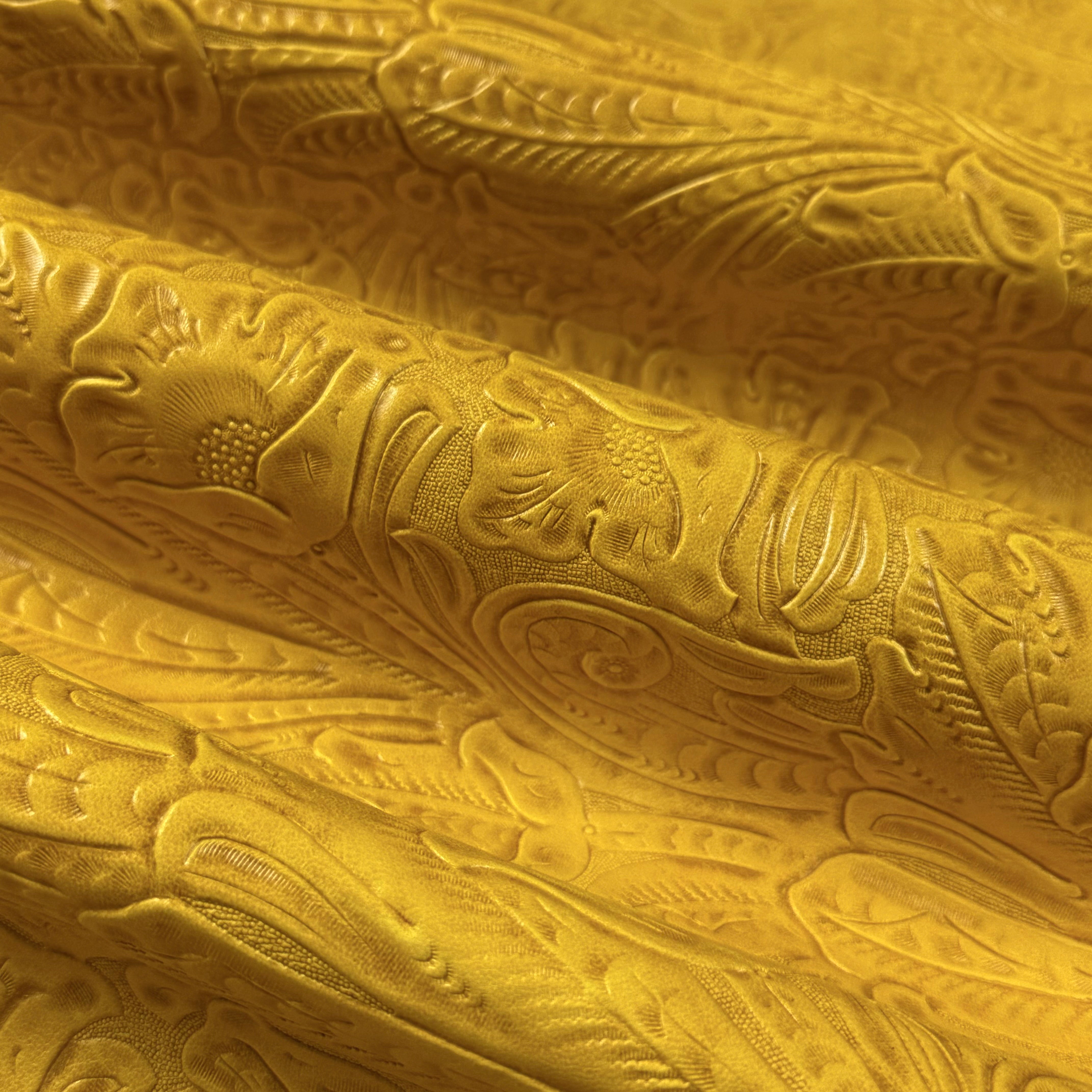 Bright yellow floral embossed oiled veg tan lamb leather with a detailed Sheridan pattern.