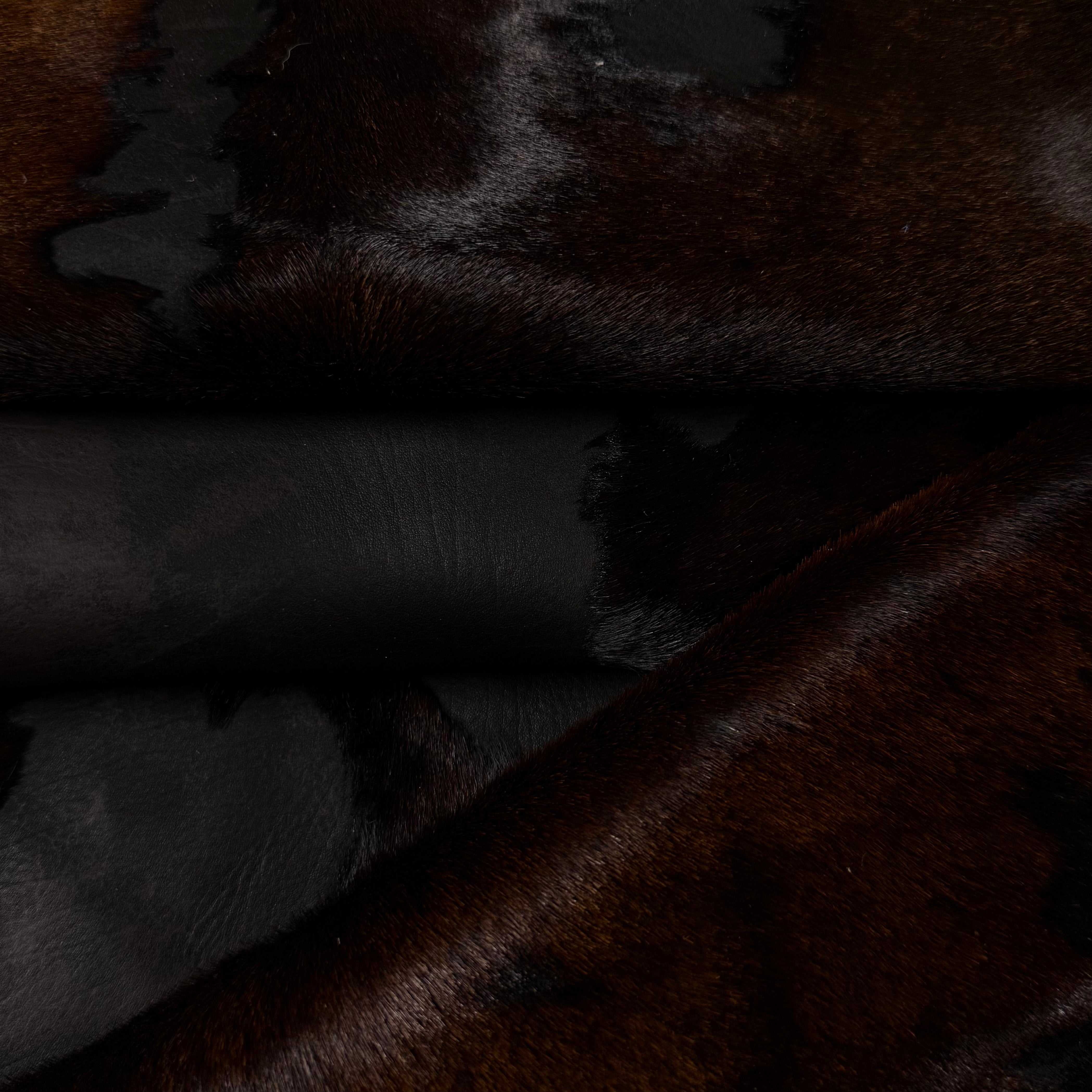 Acid Wash Cavallino Hair-On Calf leather in a two-tone rust burnout effect with natural spotting.