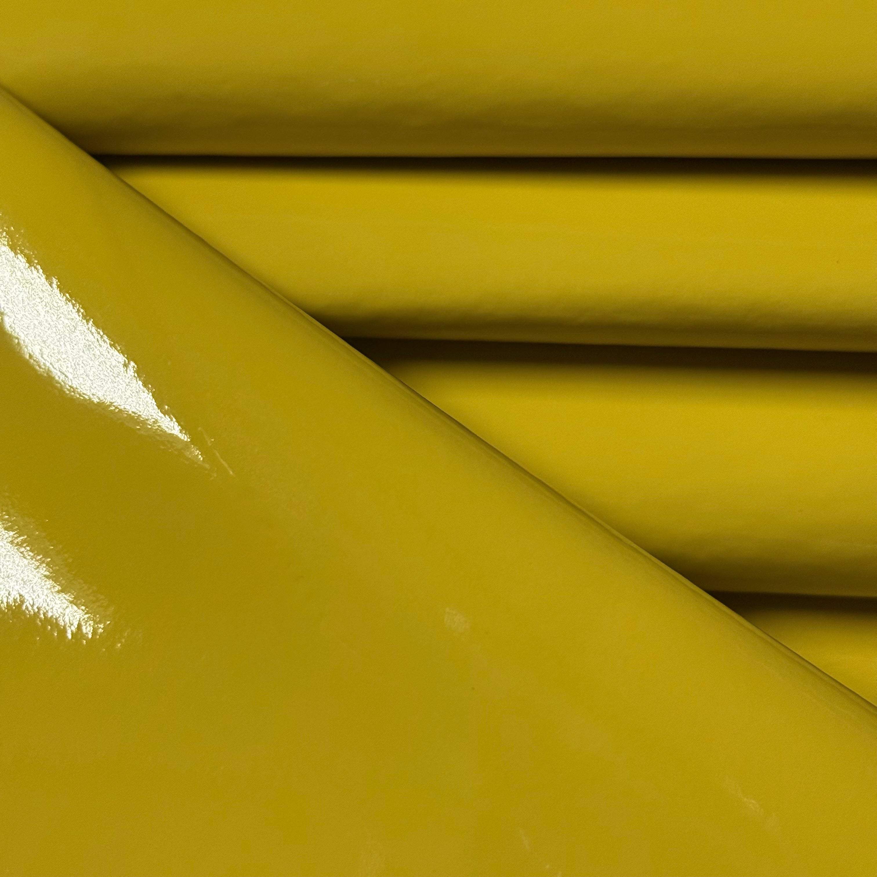 Mustard yellow Patent Pig leather, 1-2 oz weight, featuring a smooth, high-gloss reflective finish.