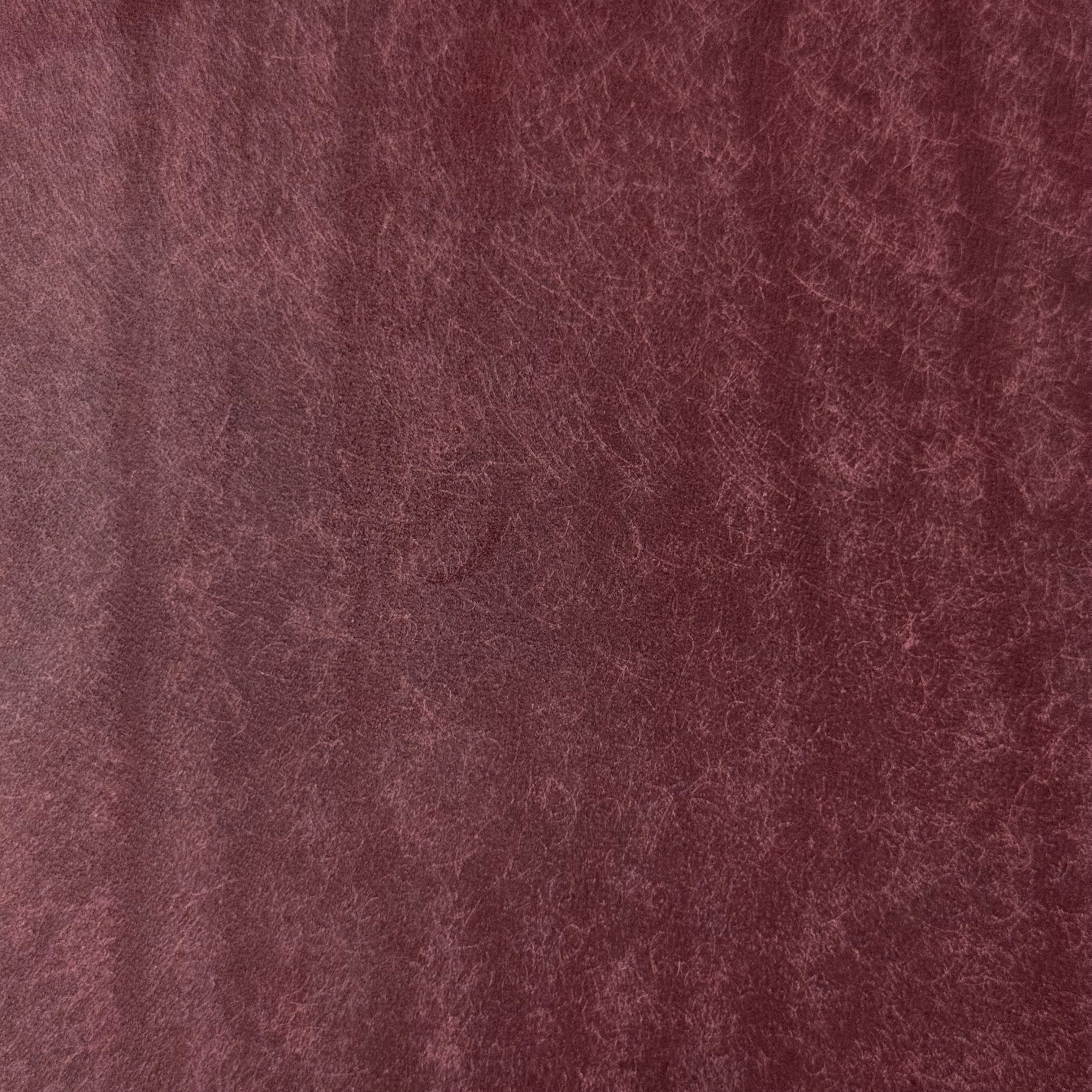 Graffiti Italian Veg Tan leather by MPG Conceria in burgundy, 3.5-4 oz with a distressed, textured finish.