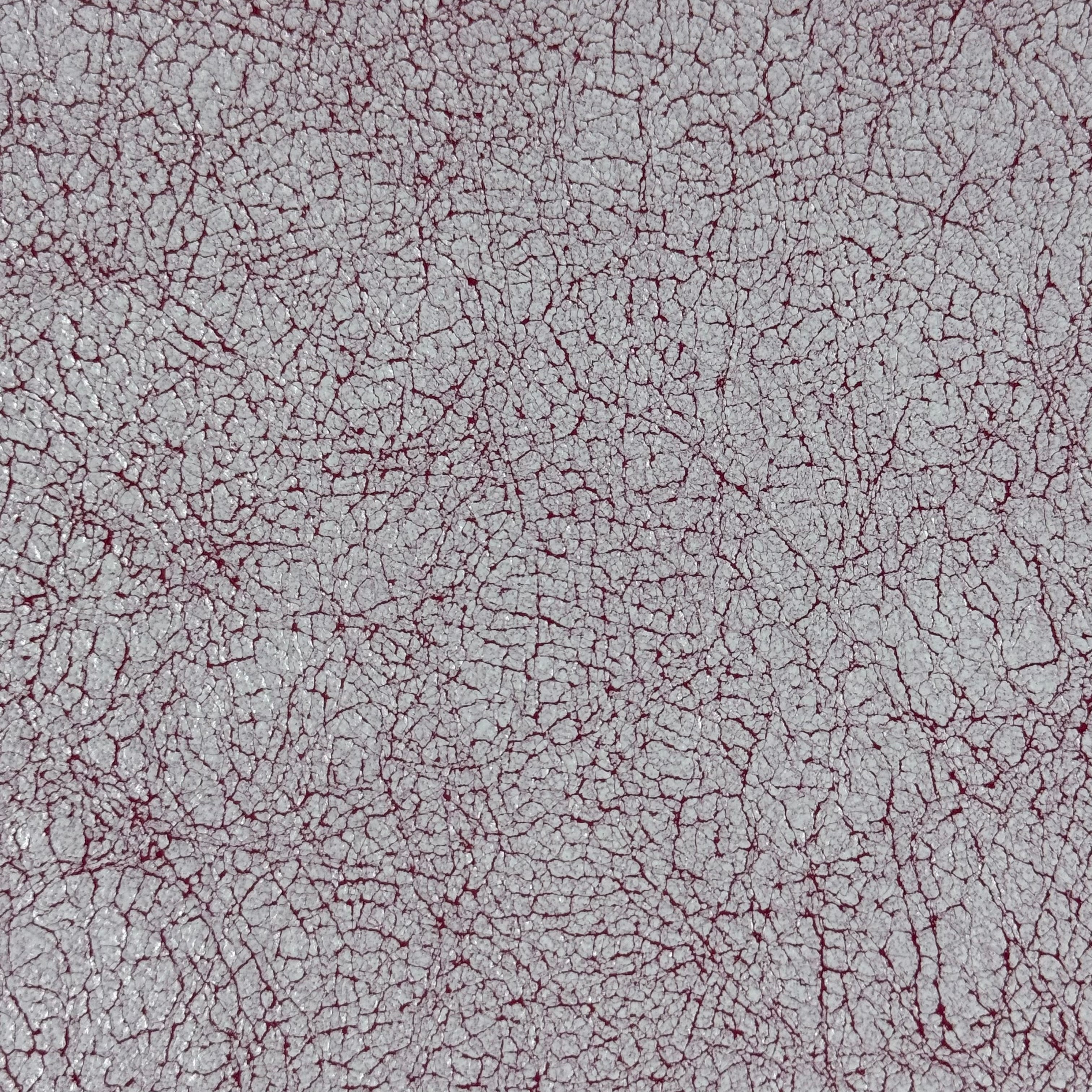 Crackle Leather in burgundy and white, featuring a distressed, textured surface with a vintage cracked pattern.