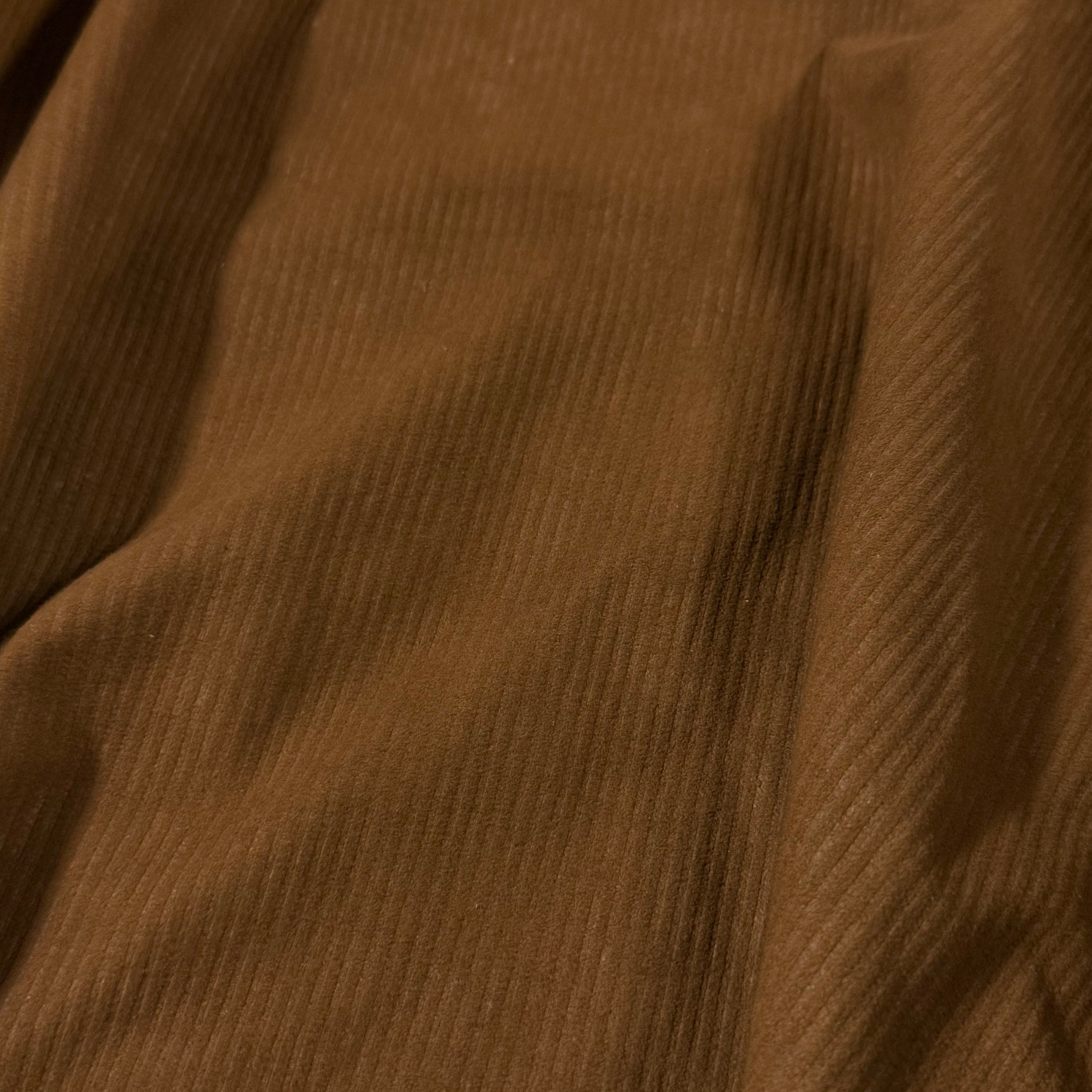 Brown Corduroy Metis Lamb Suede with a ribbed texture, ideal for apparel and accessories.