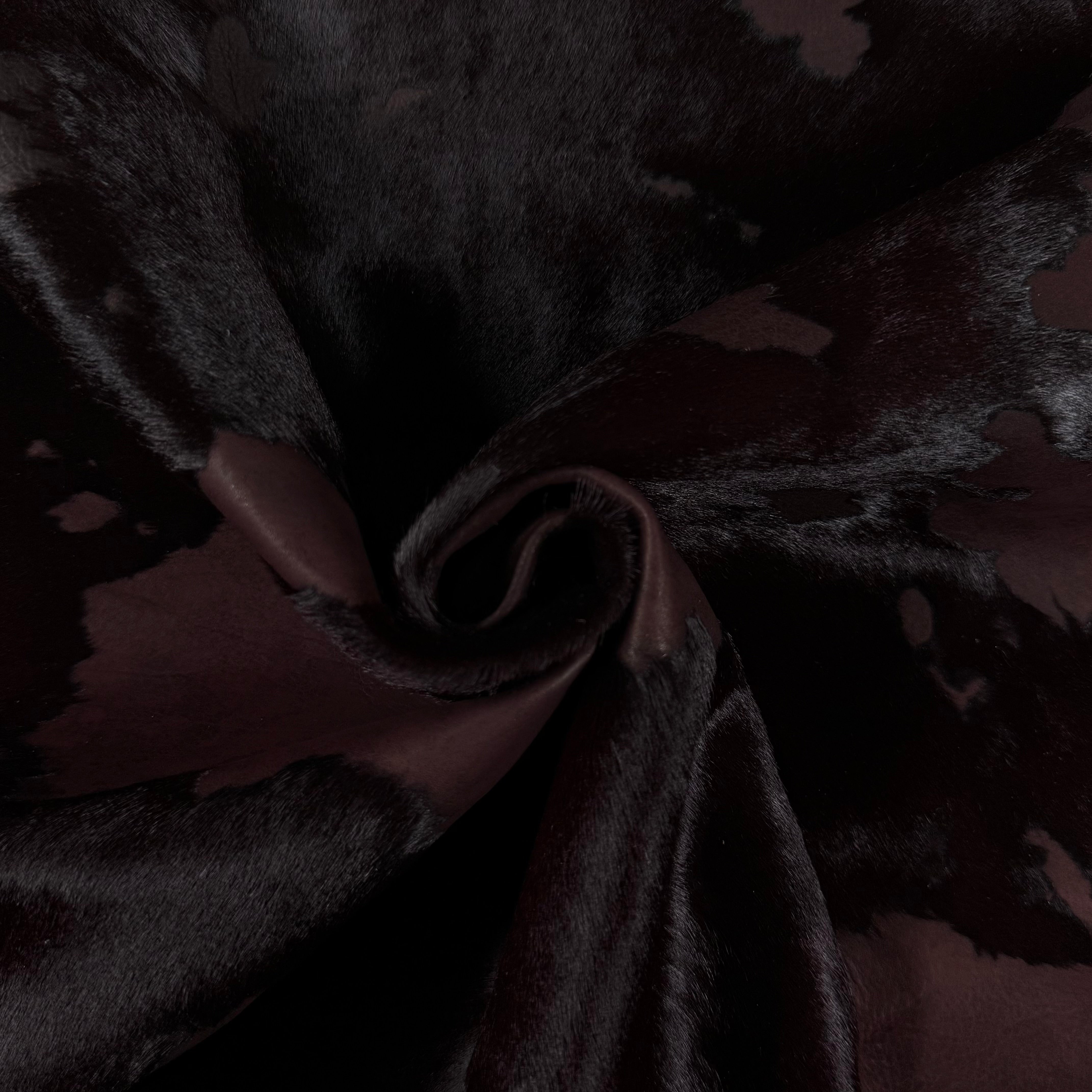 Acid Wash Cavallino Hair-On Calf leather in a dark, two-tone rust burnout effect with natural spotting.
