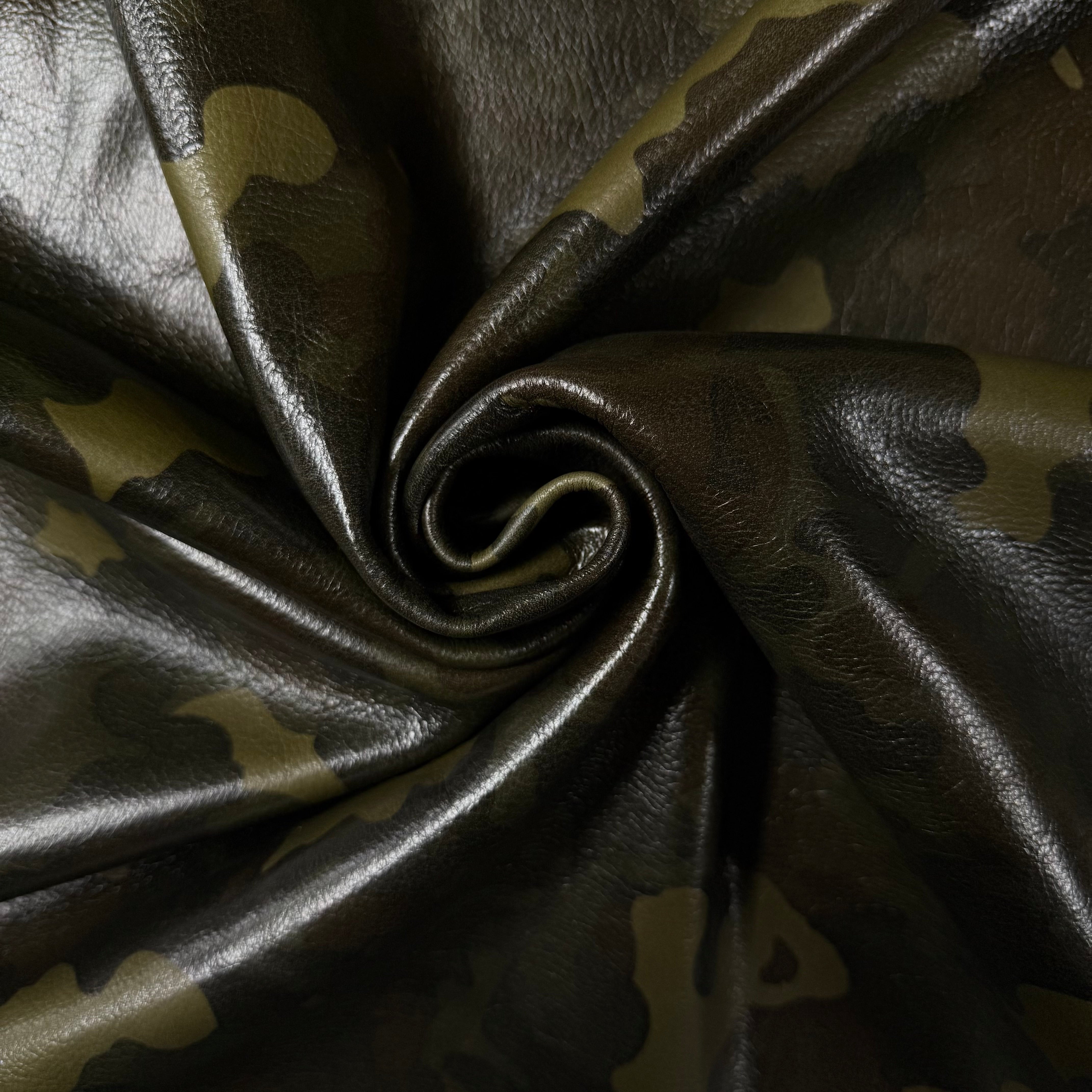 3 oz Camouflage Milled Floater Cow leather in Woodland Camo with a soft, textured, and swirled finish.