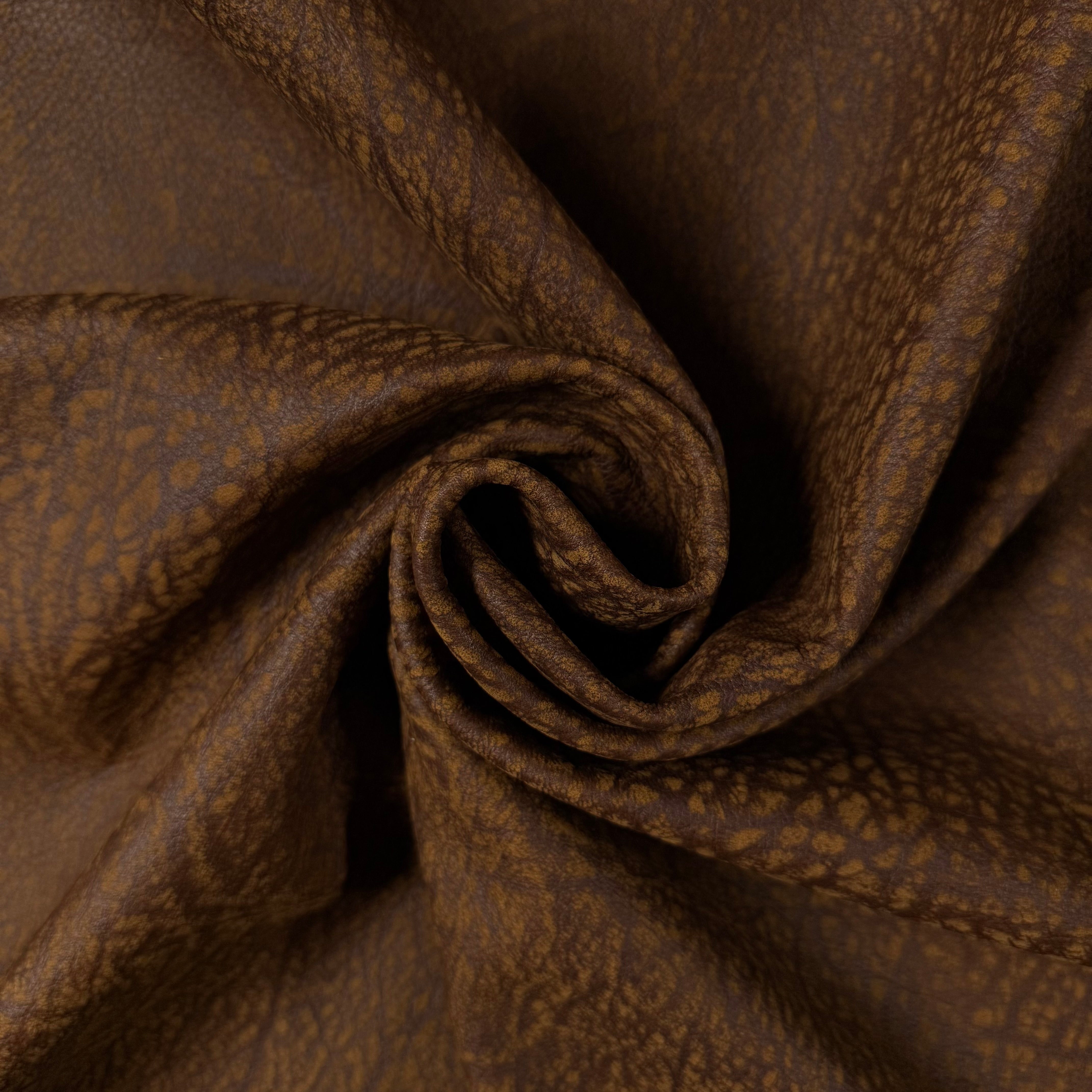 Brown Distressed Buffed Elephant Embossed Cowhide leather, 3 oz, featuring a textured, durable grain pattern.