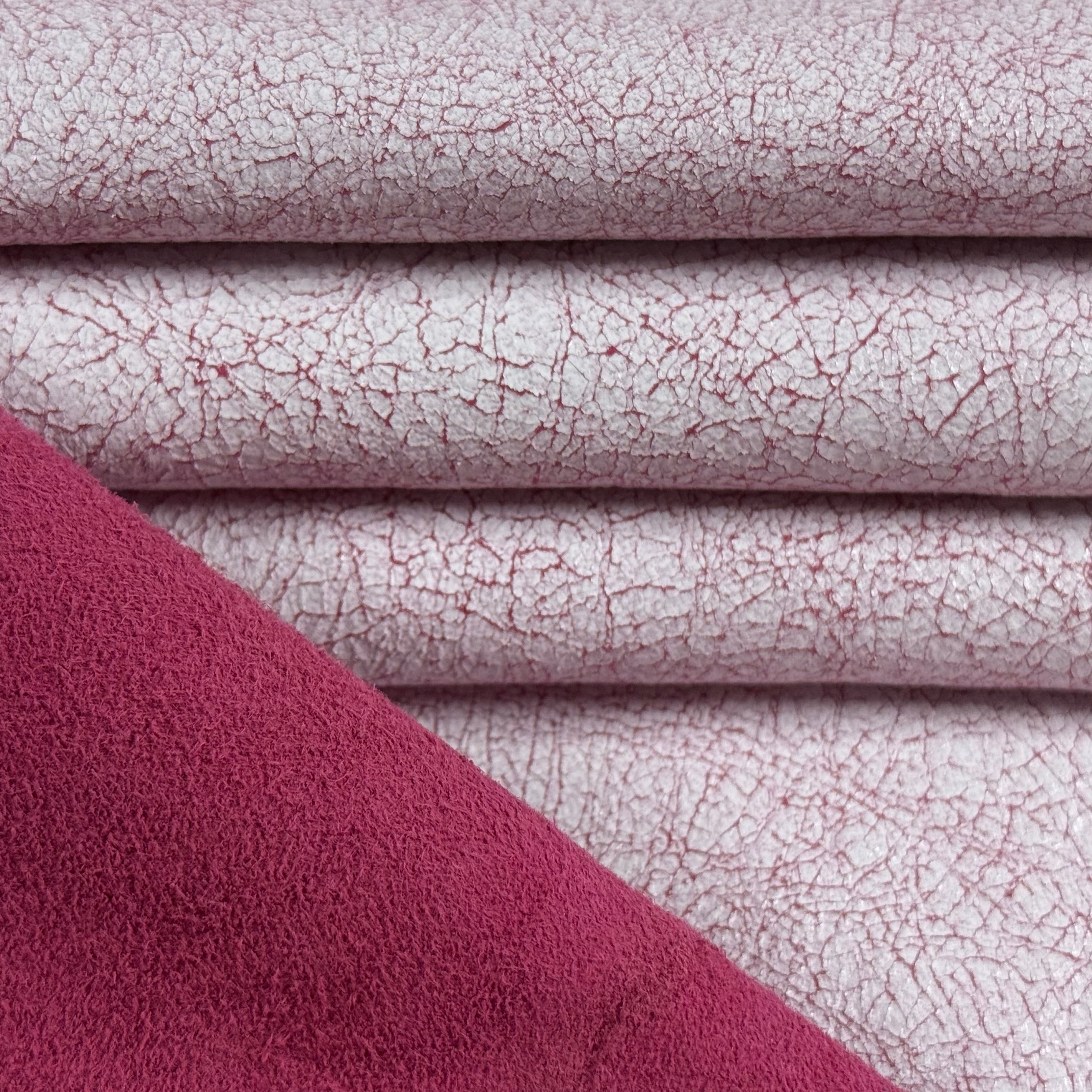 Crackle Leather in burgundy, featuring a textured, distressed surface with a soft, matte finish and layered fabric folds.