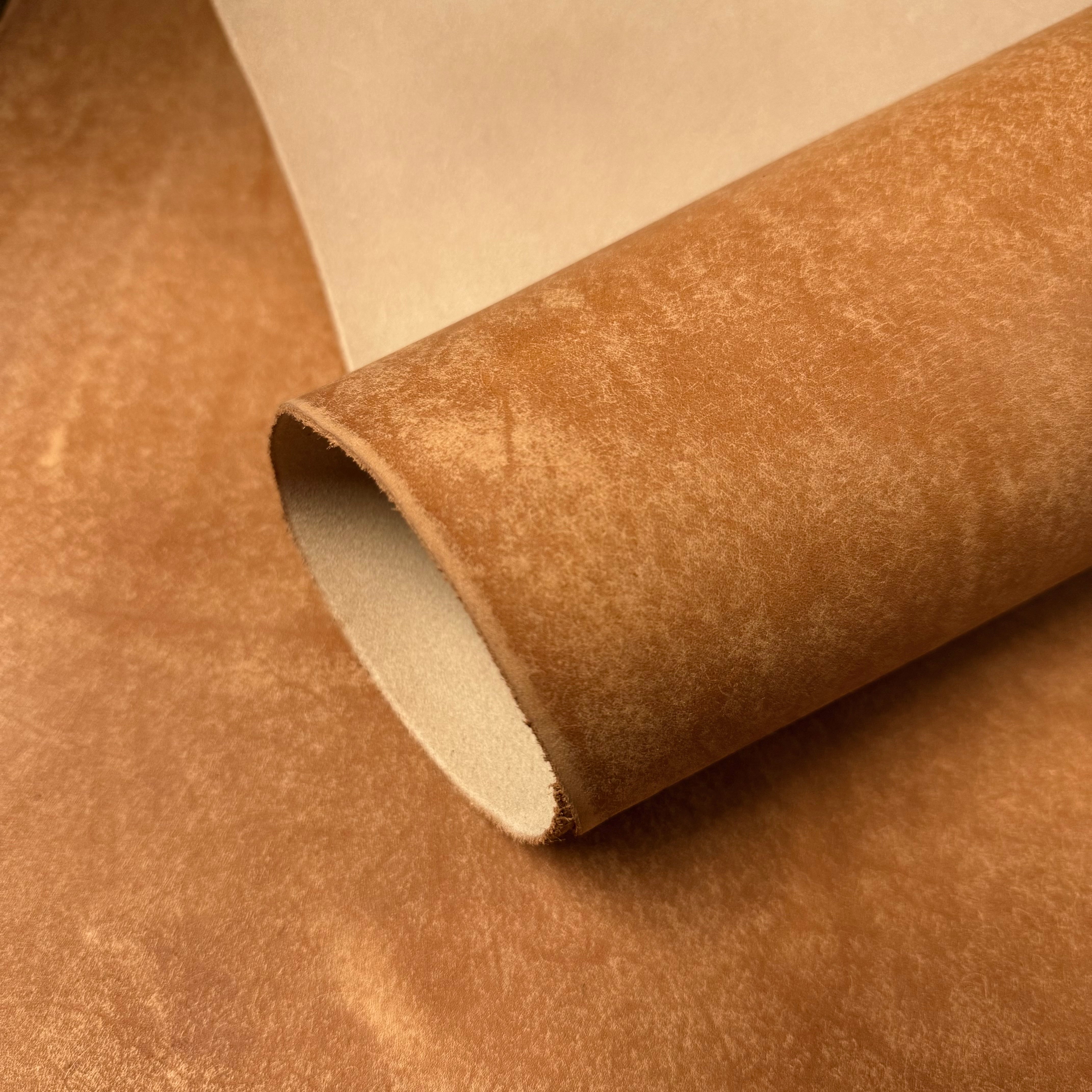 Graffiti Italian Veg Tan leather by MPG Conceria in tan, 3.5-4 oz, showing a smooth, matte textured surface.