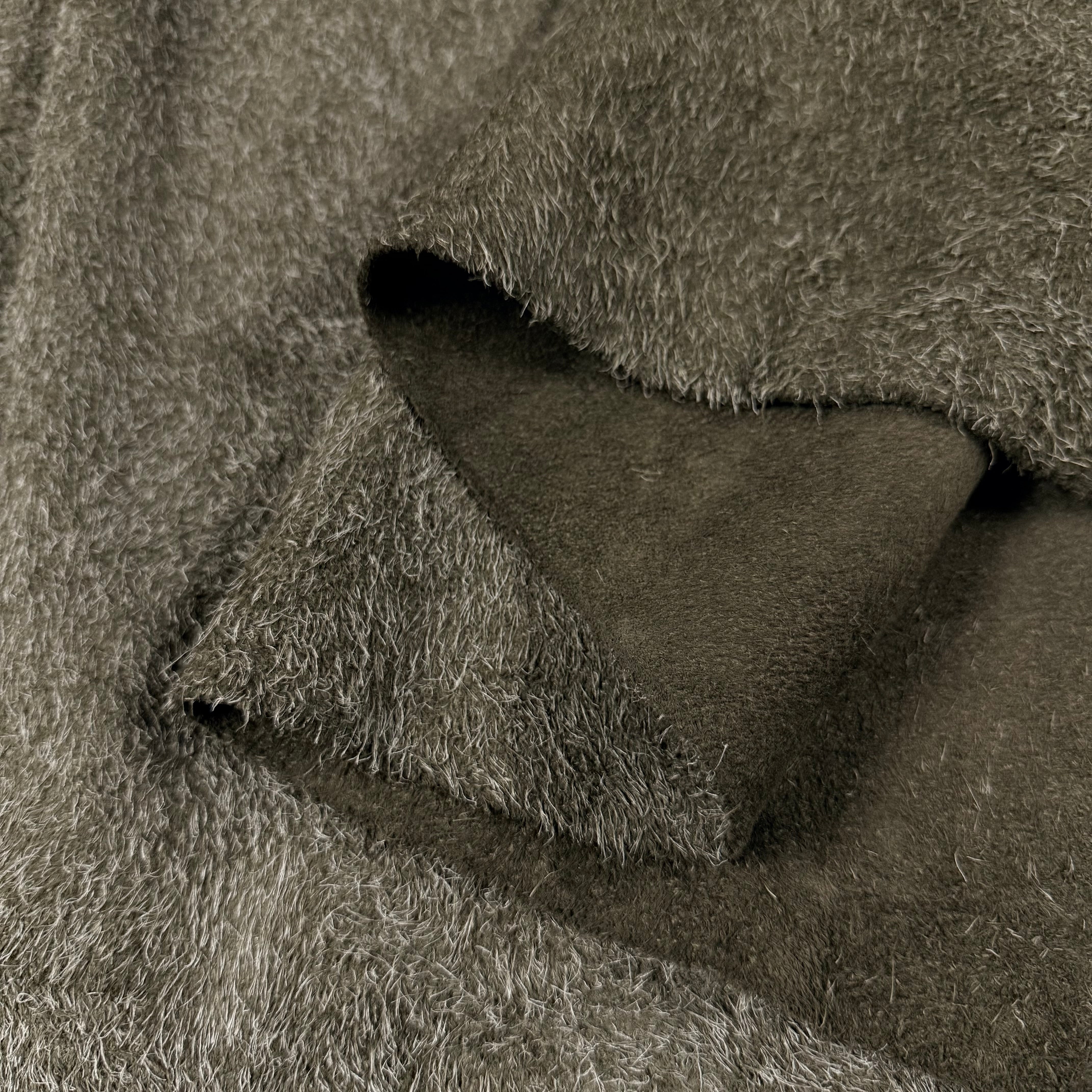 Olive green hairy calf suede leather with a soft, shaggy texture and folded edge.