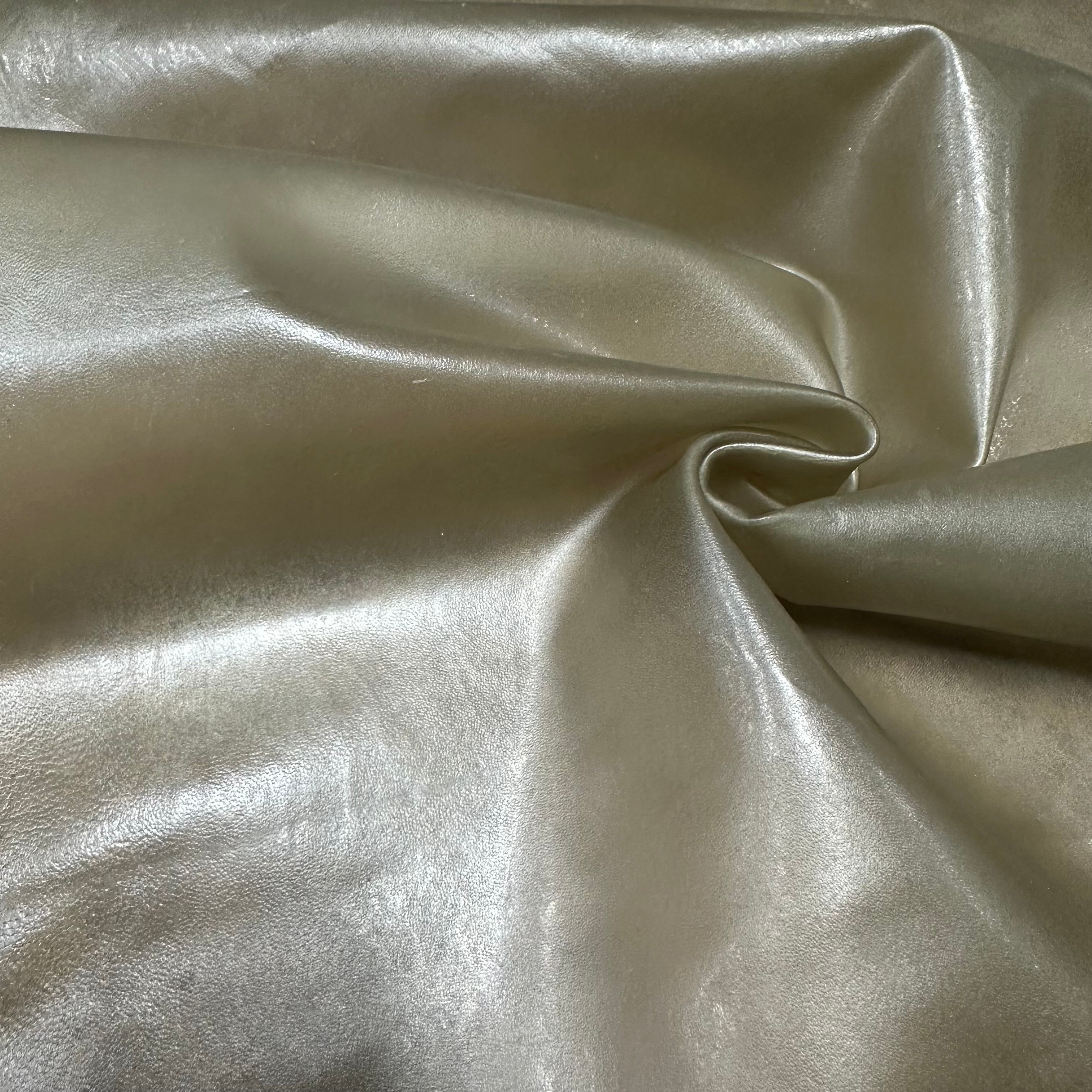 Transparent Lamb Leather in Smoke, 1.5 oz, featuring a soft, shimmering, and semi-translucent finish with elegant folds.