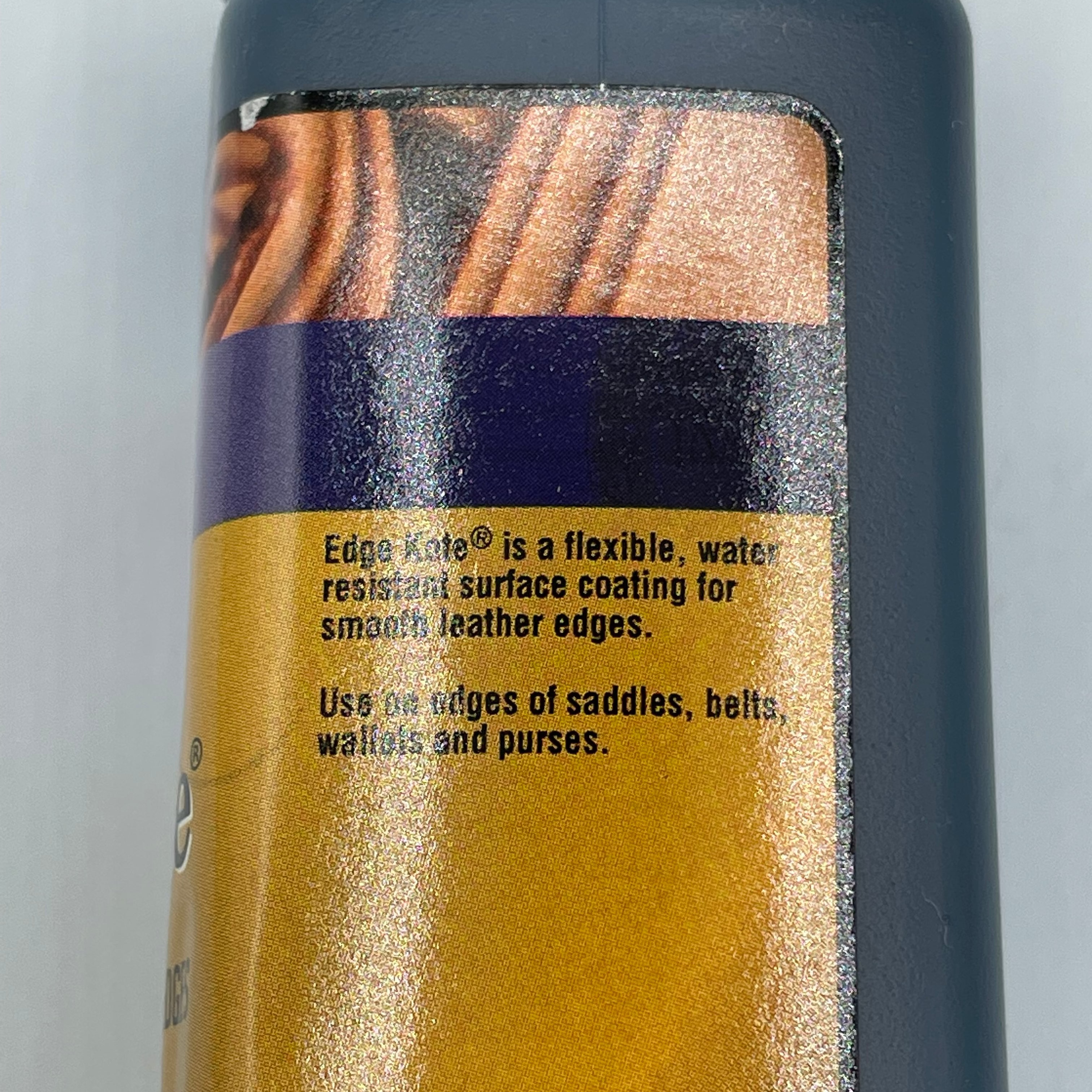 Fiebing's Edge Kote in black, a 4 oz bottle featuring a label for flexible, water-resistant leather edge coating.