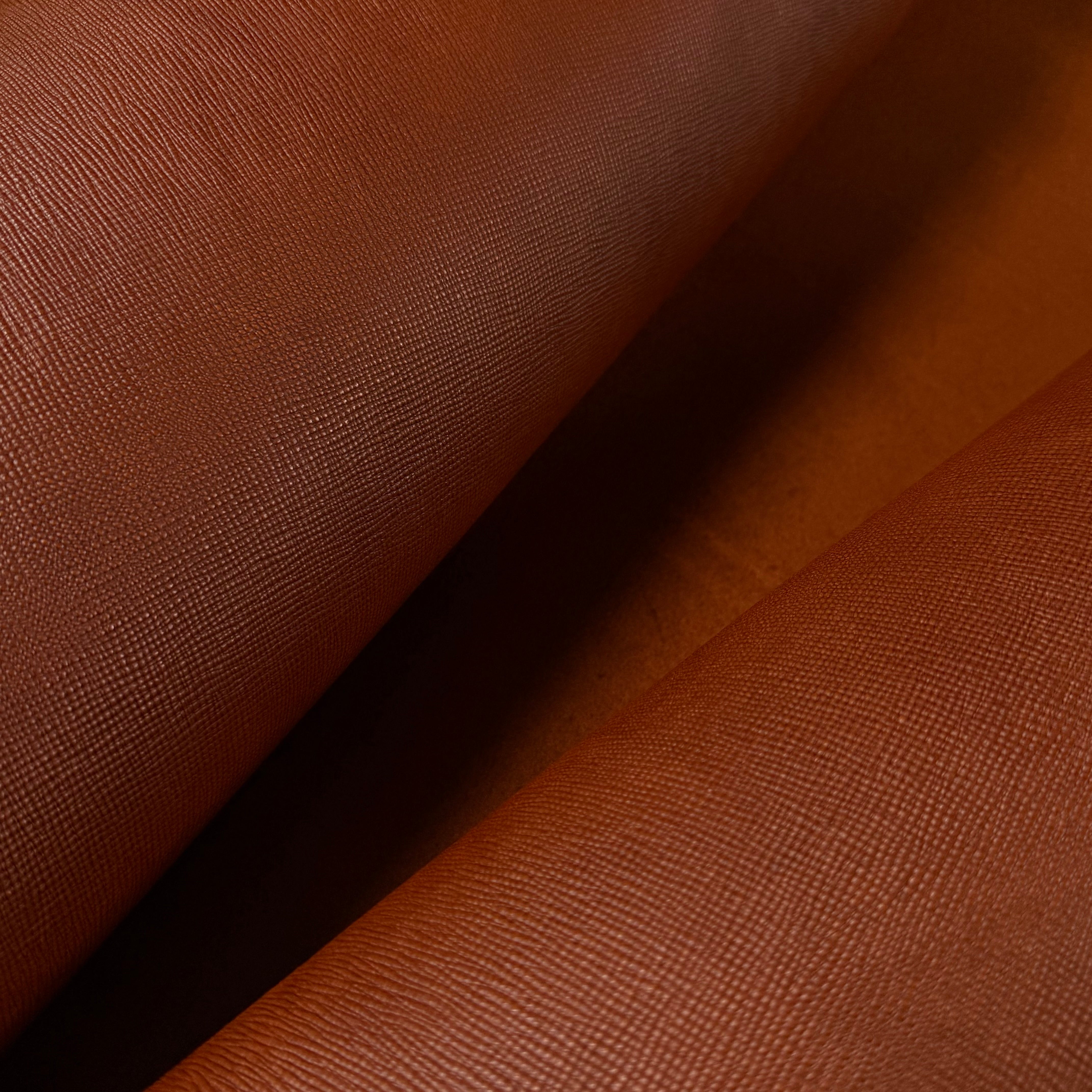 Cognac Conceria Walpier Hatch Buttero vegetable-tanned cow leather with a uniform hatch-embossed texture.