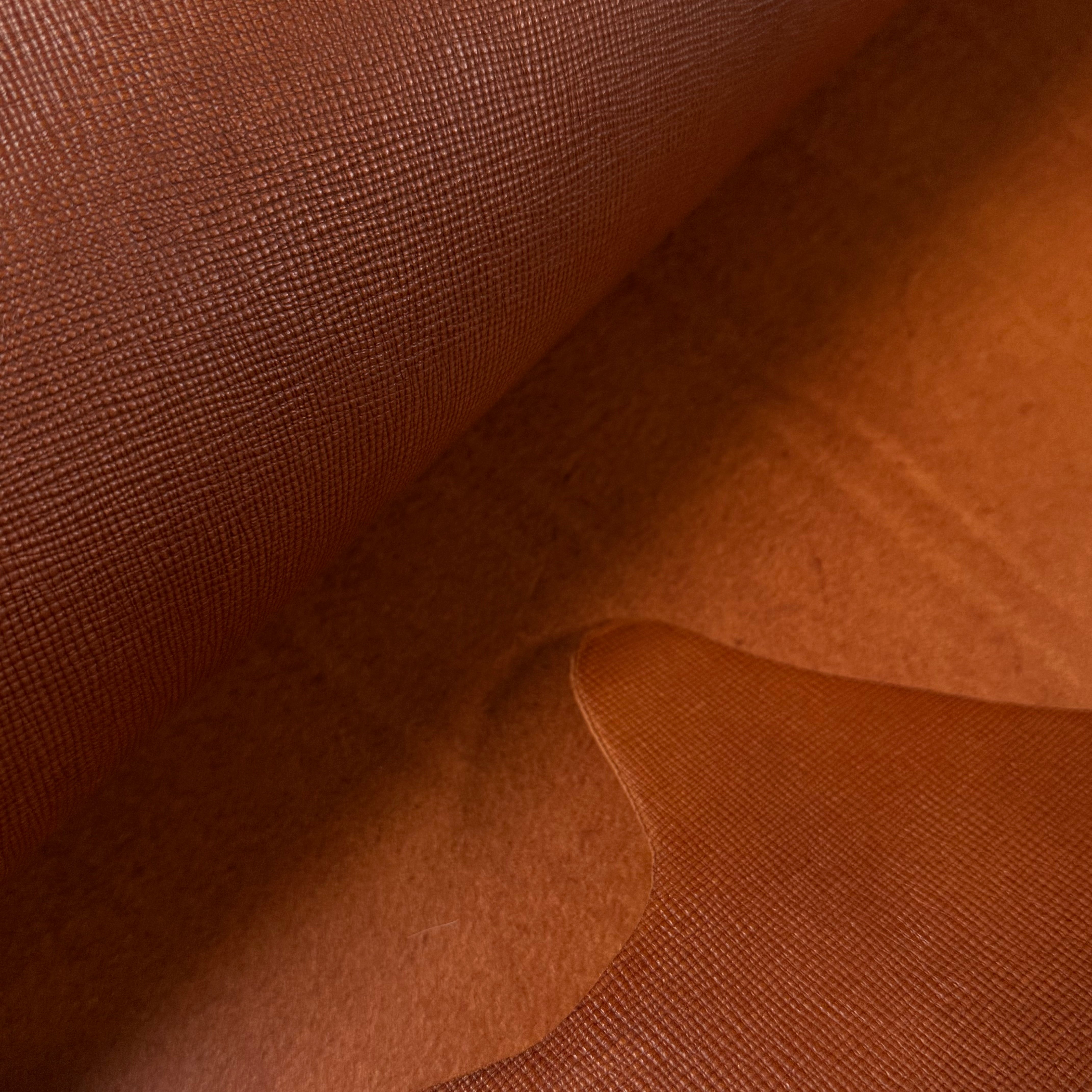 Cognac Walpier Hatch Buttero vegetable-tanned cow leather, 5 oz, with uniform embossed texture.