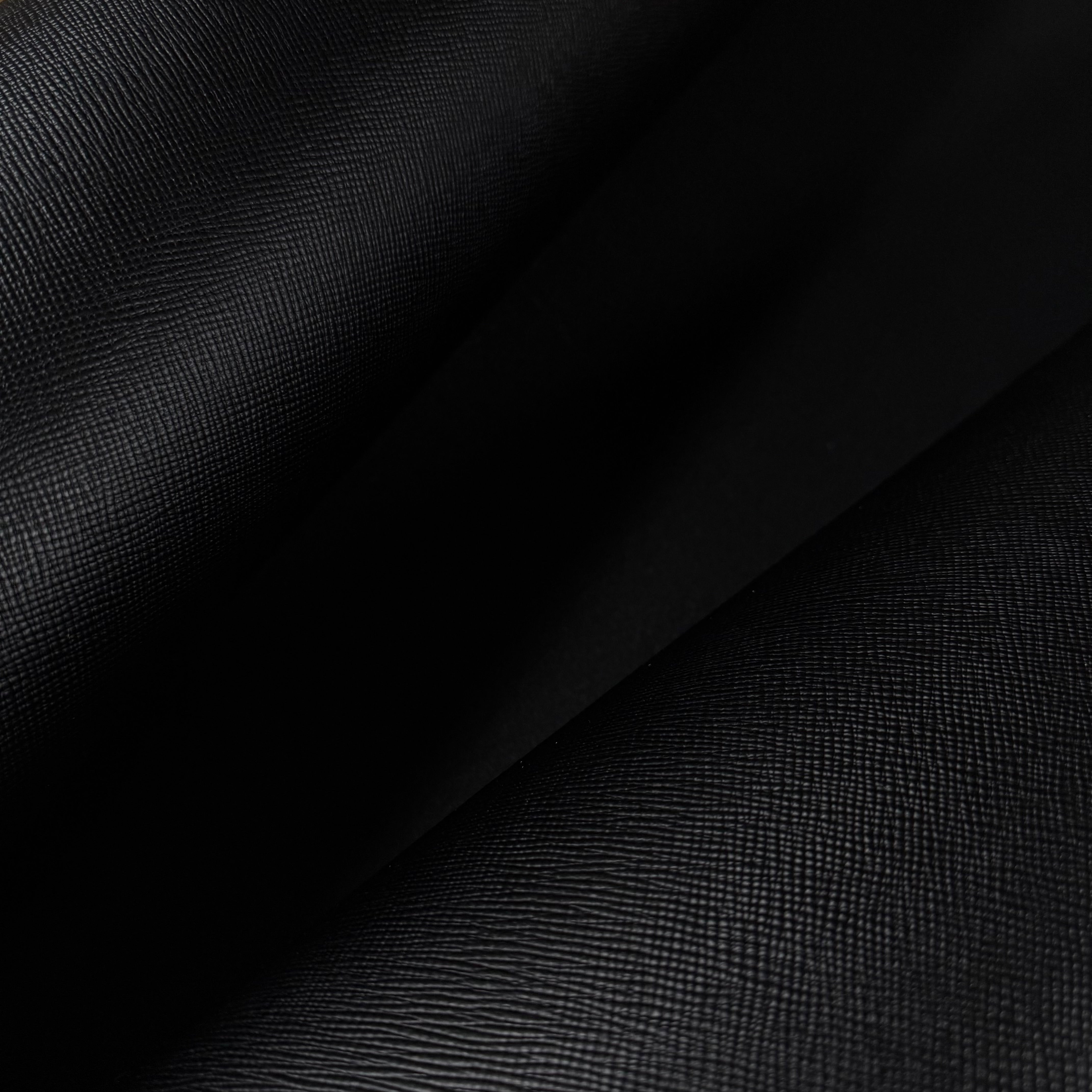 Black Walpier Hatch Buttero vegetable tanned cow leather with a uniform embossed texture.