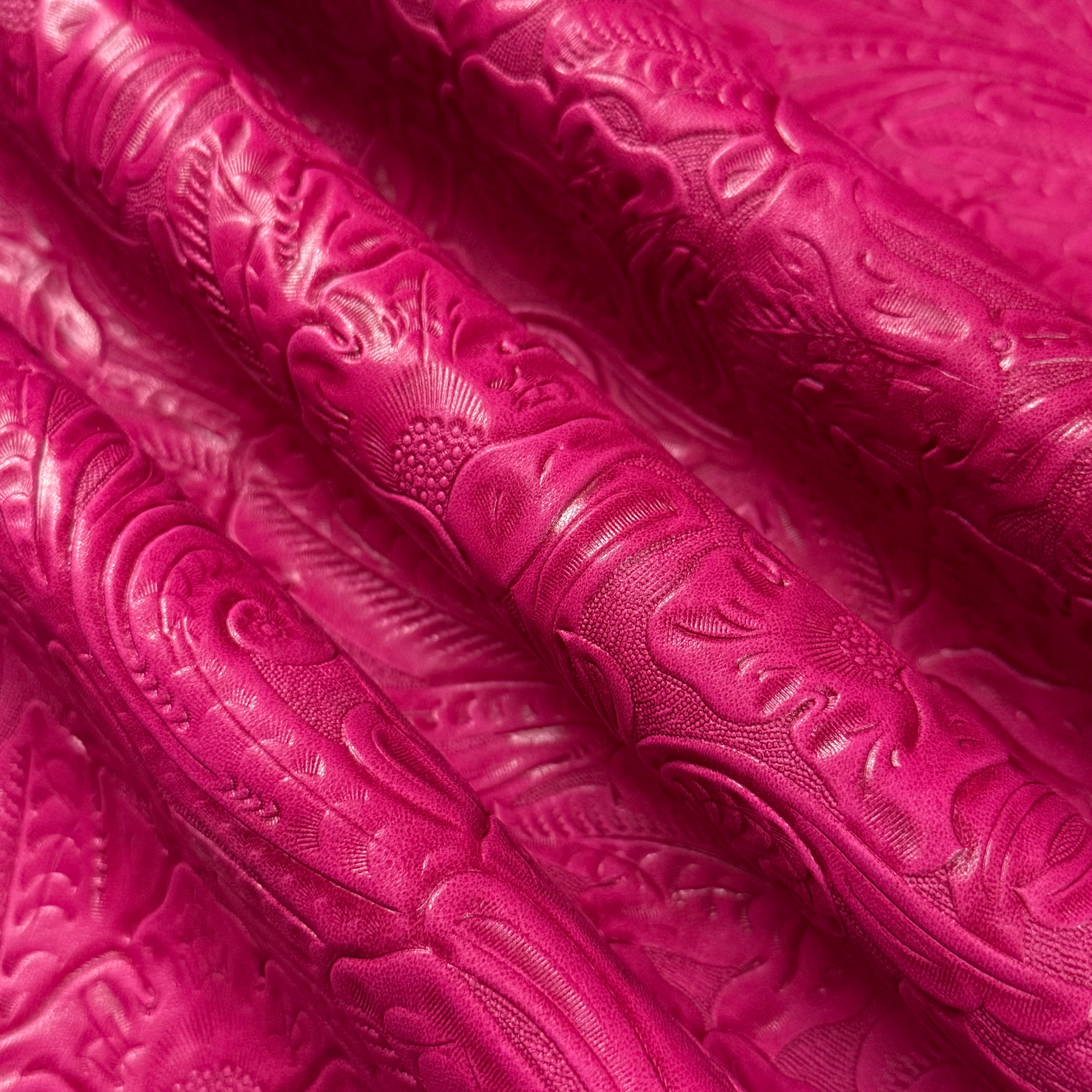 Bright pink floral embossed oiled veg tan lamb leather, 2 oz, with a detailed Sheridan pattern.