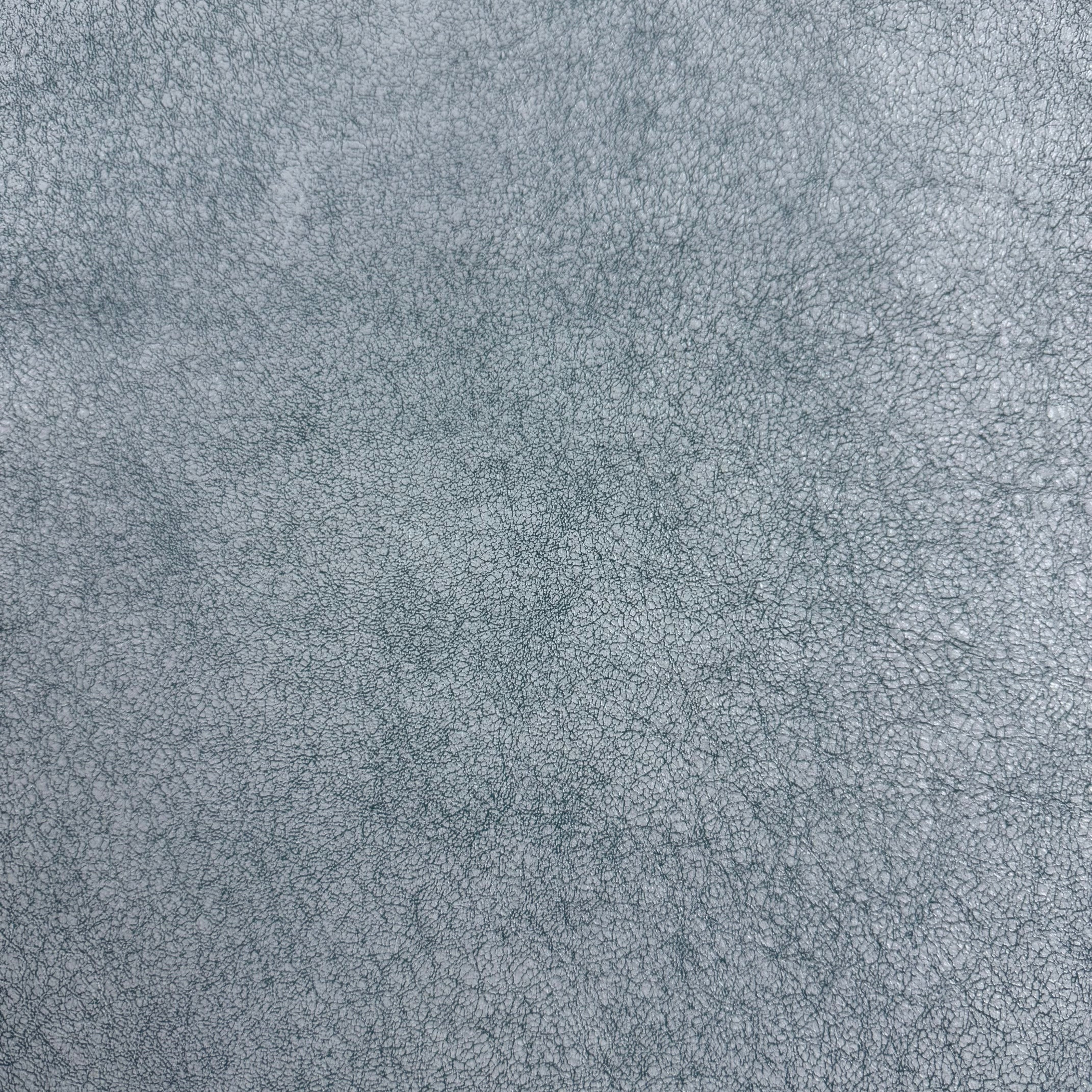 Crackle Leather in grey, featuring a textured, distressed surface with a fine, intricate webbed pattern.