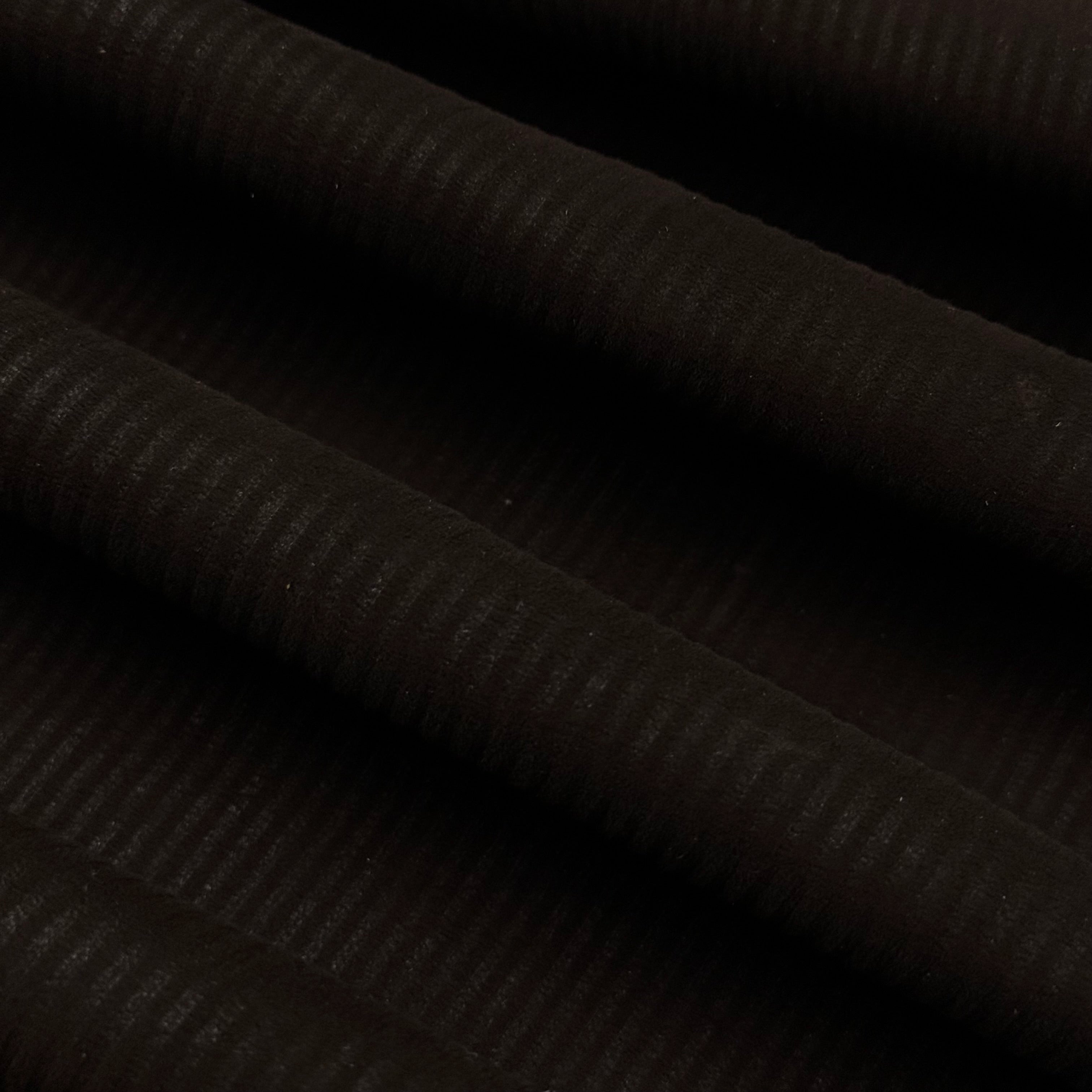 Dark brown corduroy Metis lamb suede with a ribbed texture and soft folds.