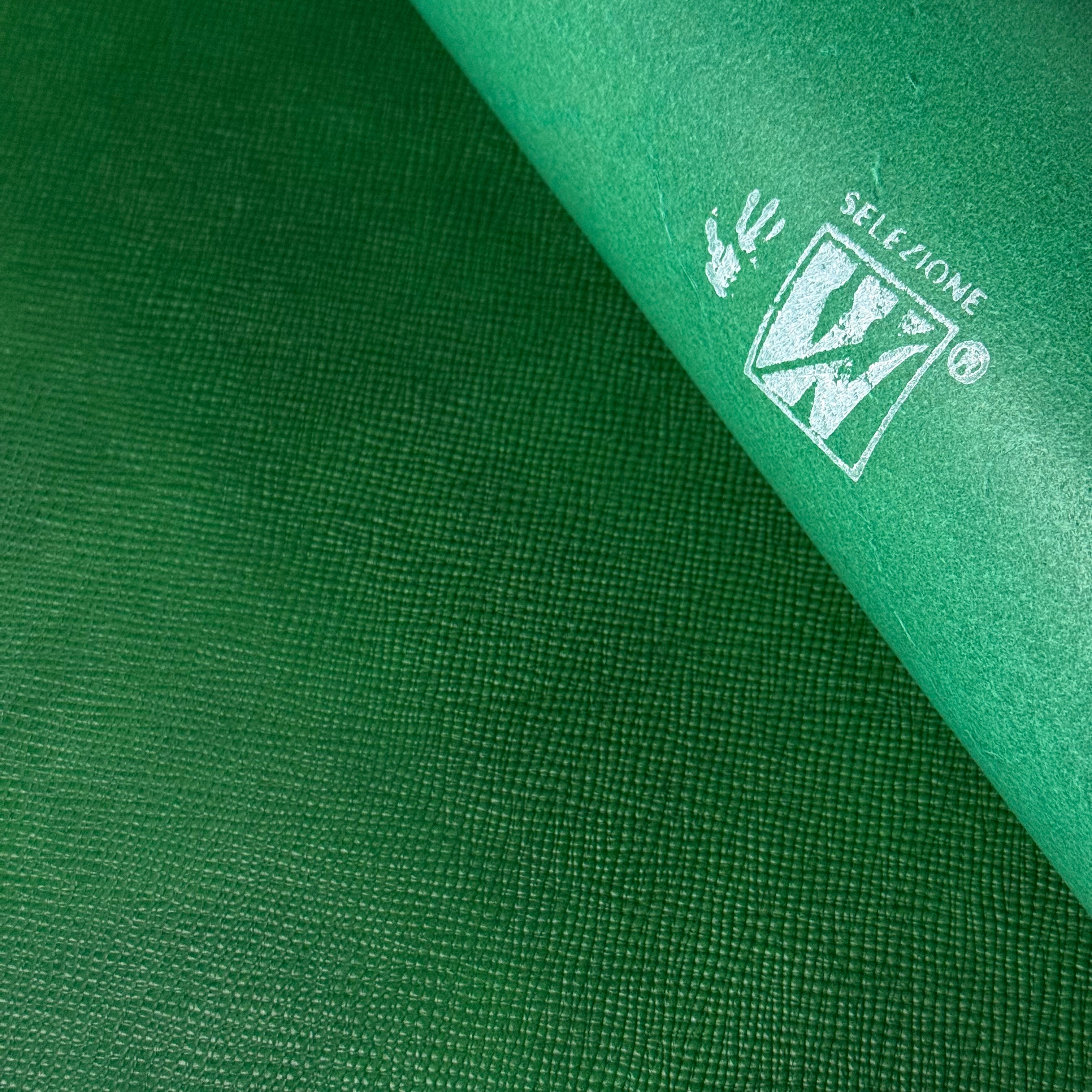 Green Conceria Walpier Hatch Buttero vegetable-tanned cow leather with embossed texture and "SELEZIONE W" stamp.