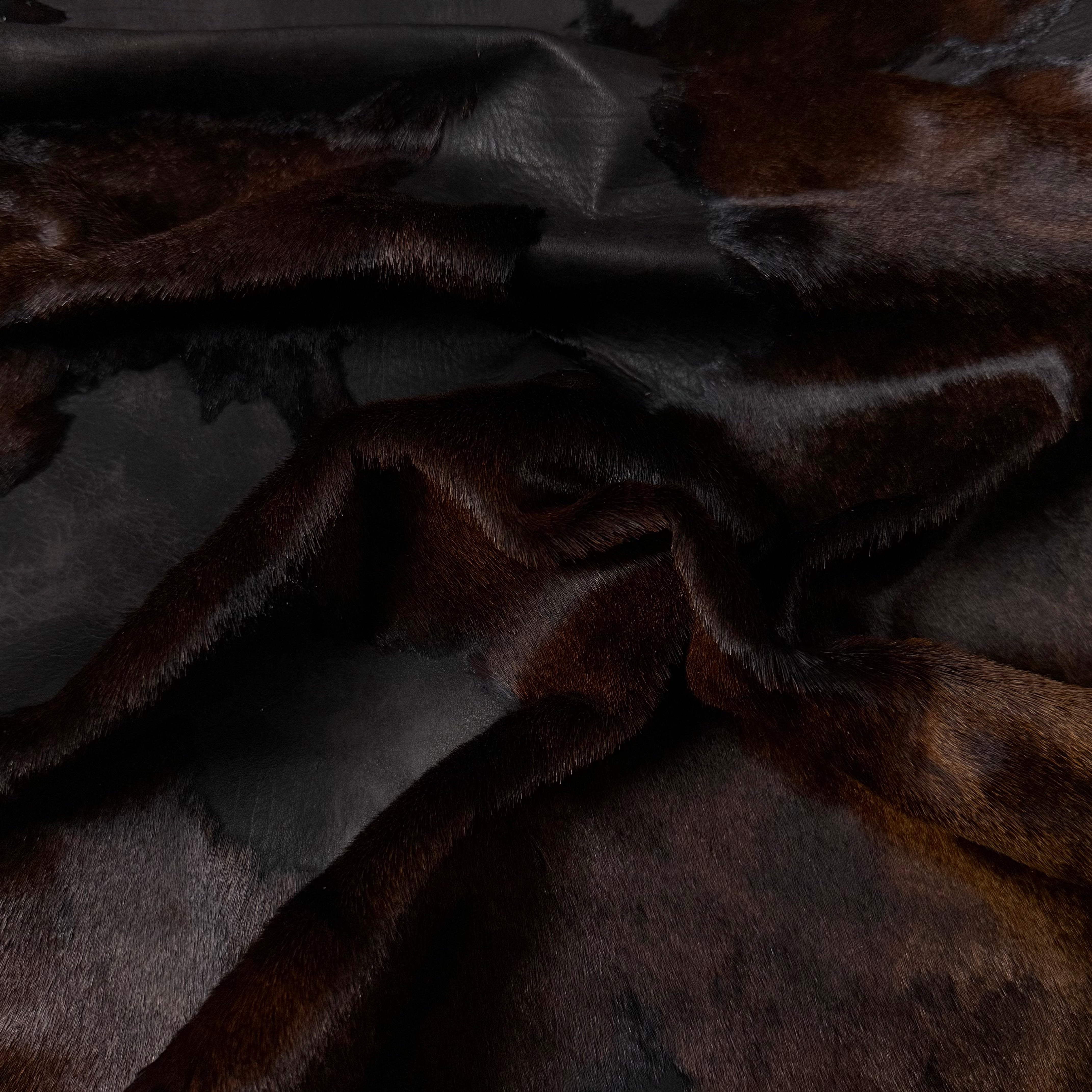 Acid Wash Cavallino Hair-On Calf leather in a dark, two-tone rust burnout effect with short, sheared hair.