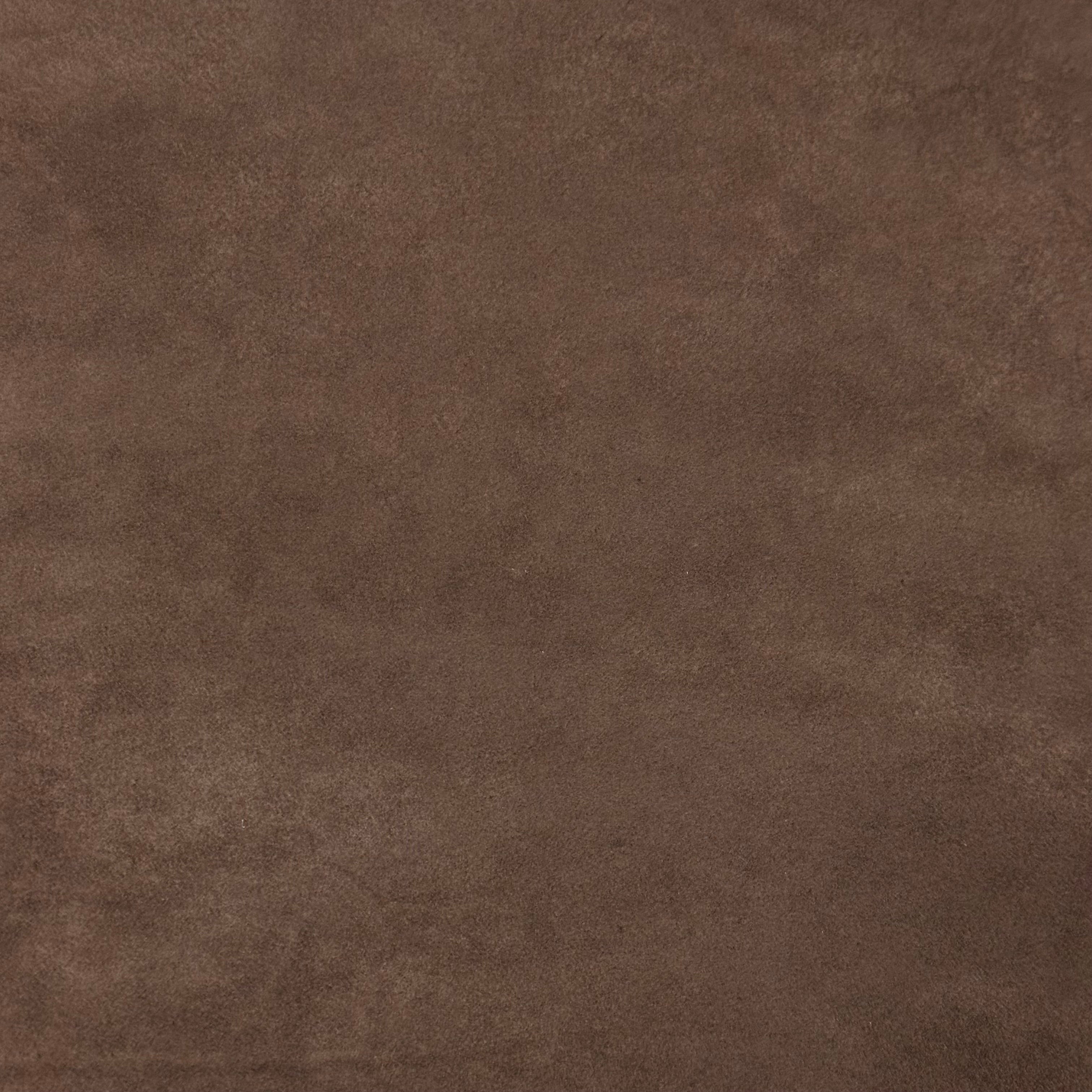 Close-up of brown Conceria Incas Italian Water Calf leather with a soft, suede-like finish.