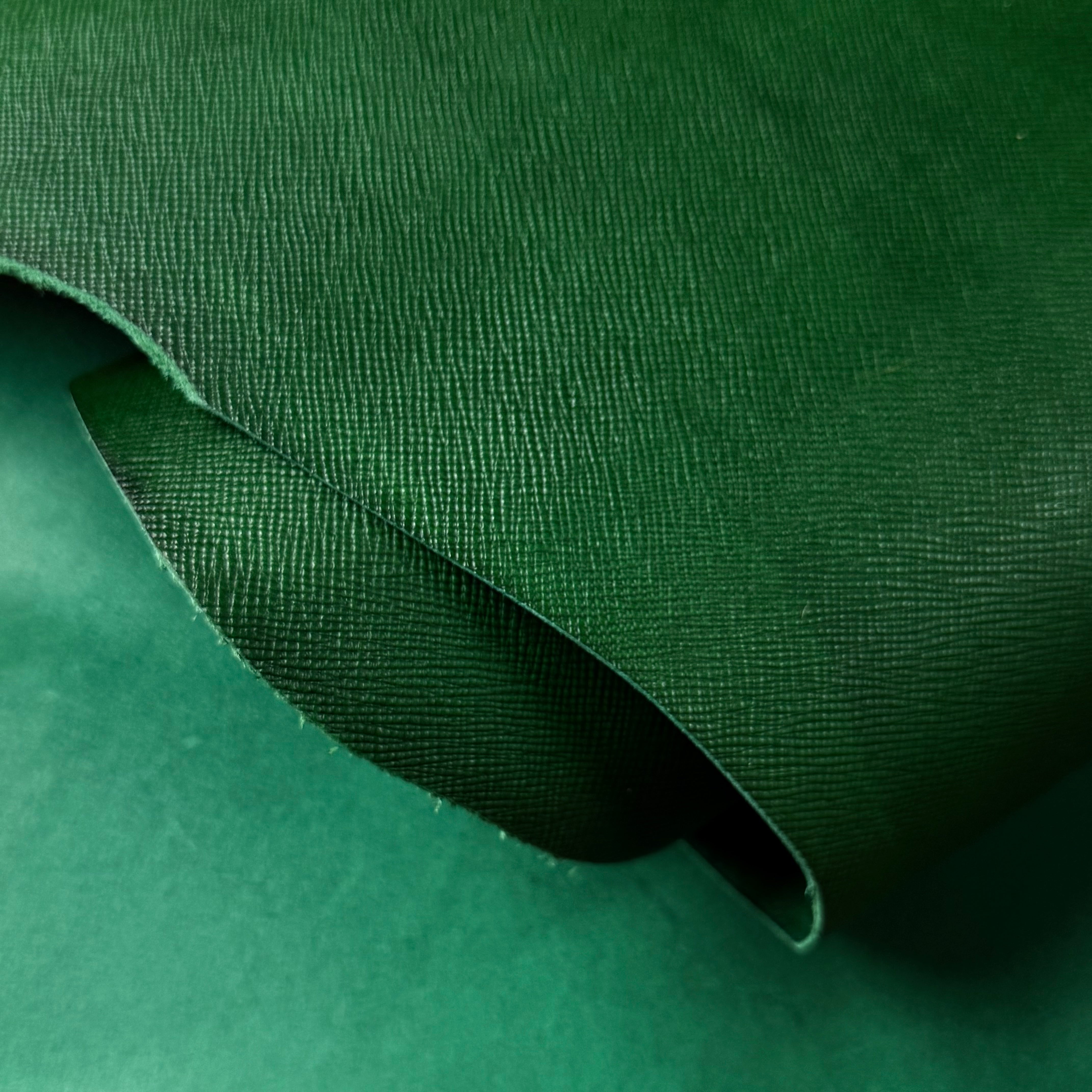Green Conceria Walpier Hatch Buttero Italian vegetable tanned cow leather with a uniform embossed texture.