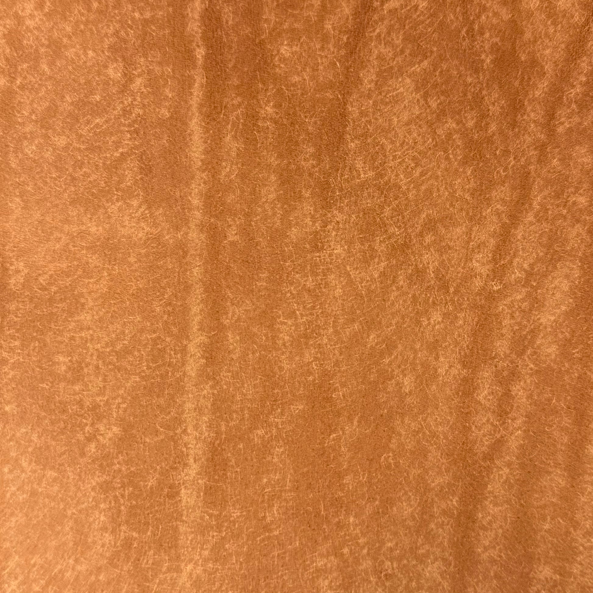 Graffiti Italian Veg Tan leather by MPG Conceria in tan, 3.5-4 oz weight with a textured, distressed finish.
