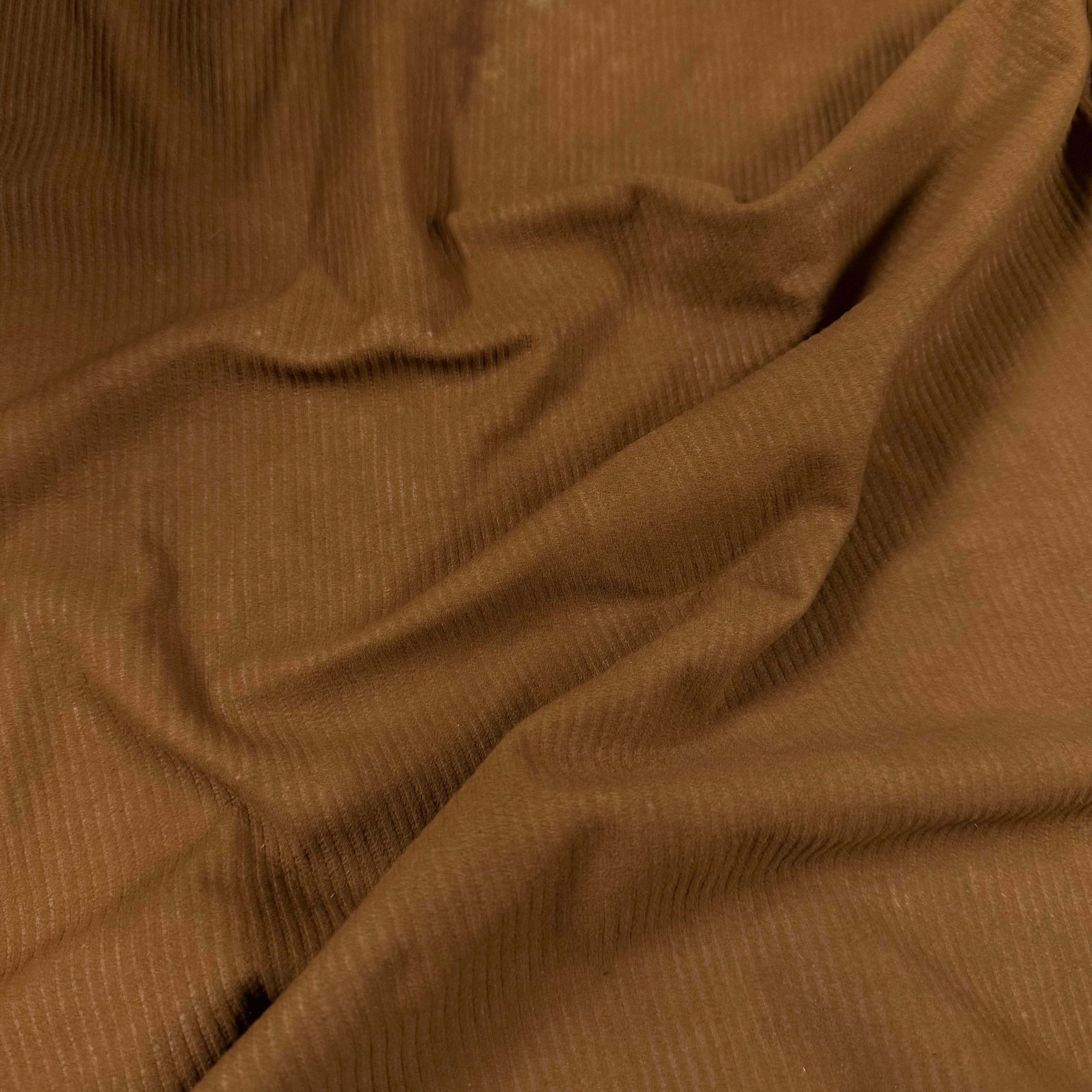 Brown Corduroy Metis Lamb Suede with ribbed texture and soft folds.