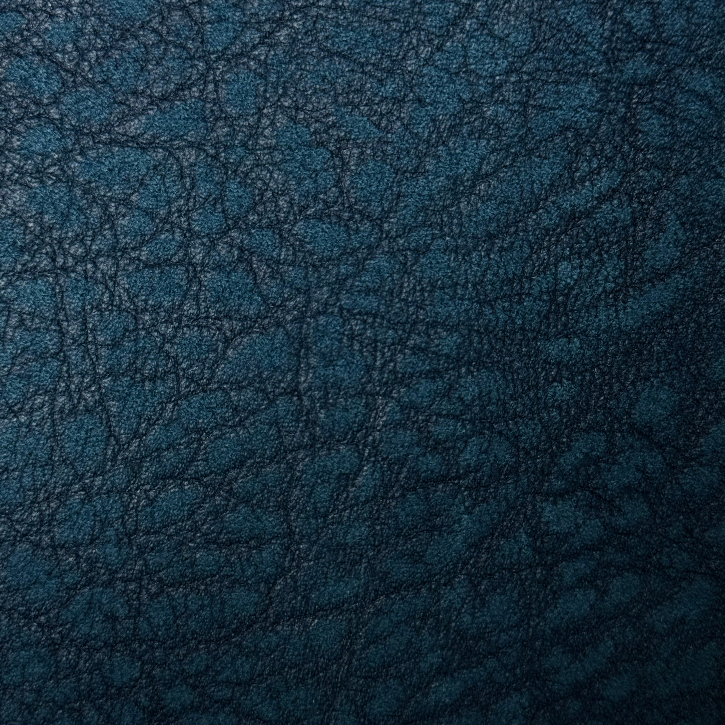 Teal distressed buffed elephant embossed cowhide leather, 3 oz, featuring a textured, rugged grain pattern.