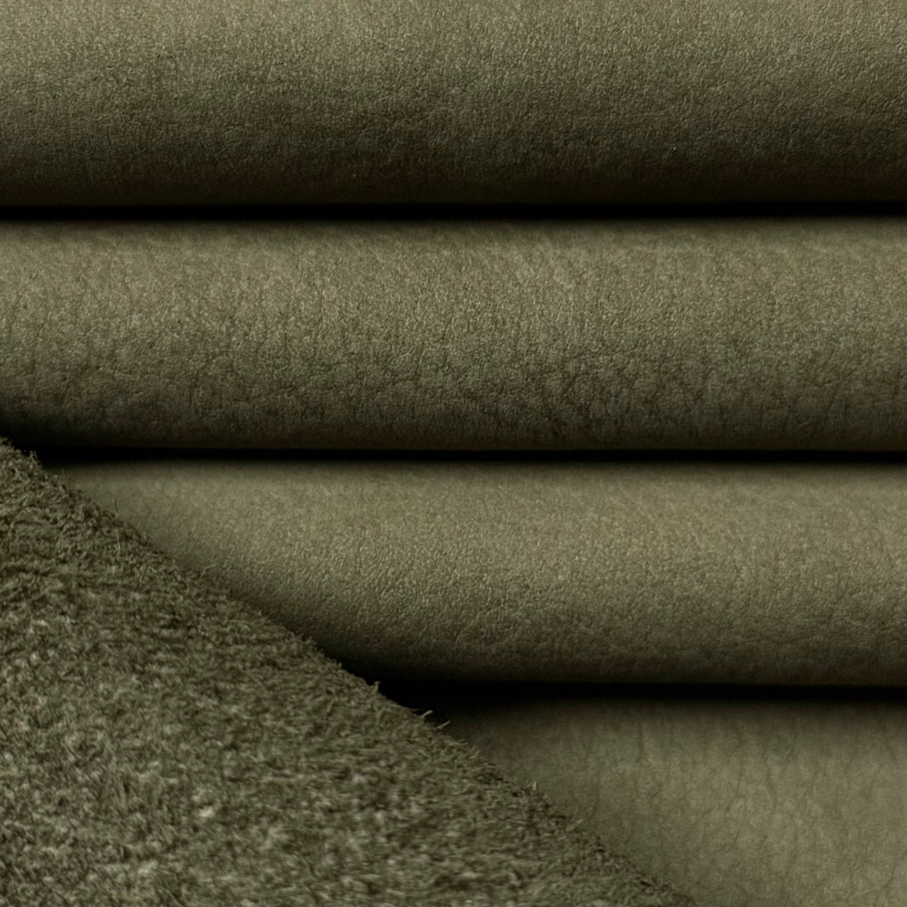 Olive green premium top grain nubuck cowhide leather, 3-4 oz weight, showing soft velvet texture and folded layers.